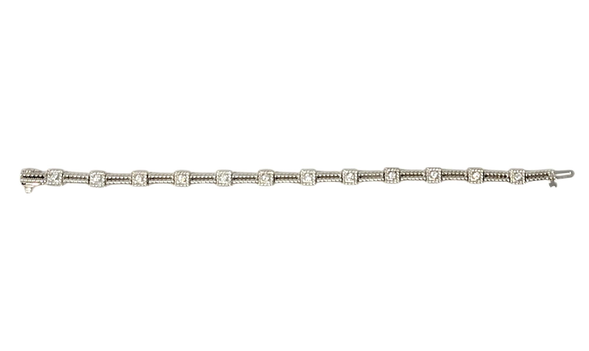 Stunning diamond station bracelet with a twisted cable design set in polished white gold. 

Metal: 14 Karat White Gold
Natural Diamonds: .72 carat total weight
Diamond cut: Round Brilliant
Diamond color: F
Diamond clarity: VS
Length: 6.75