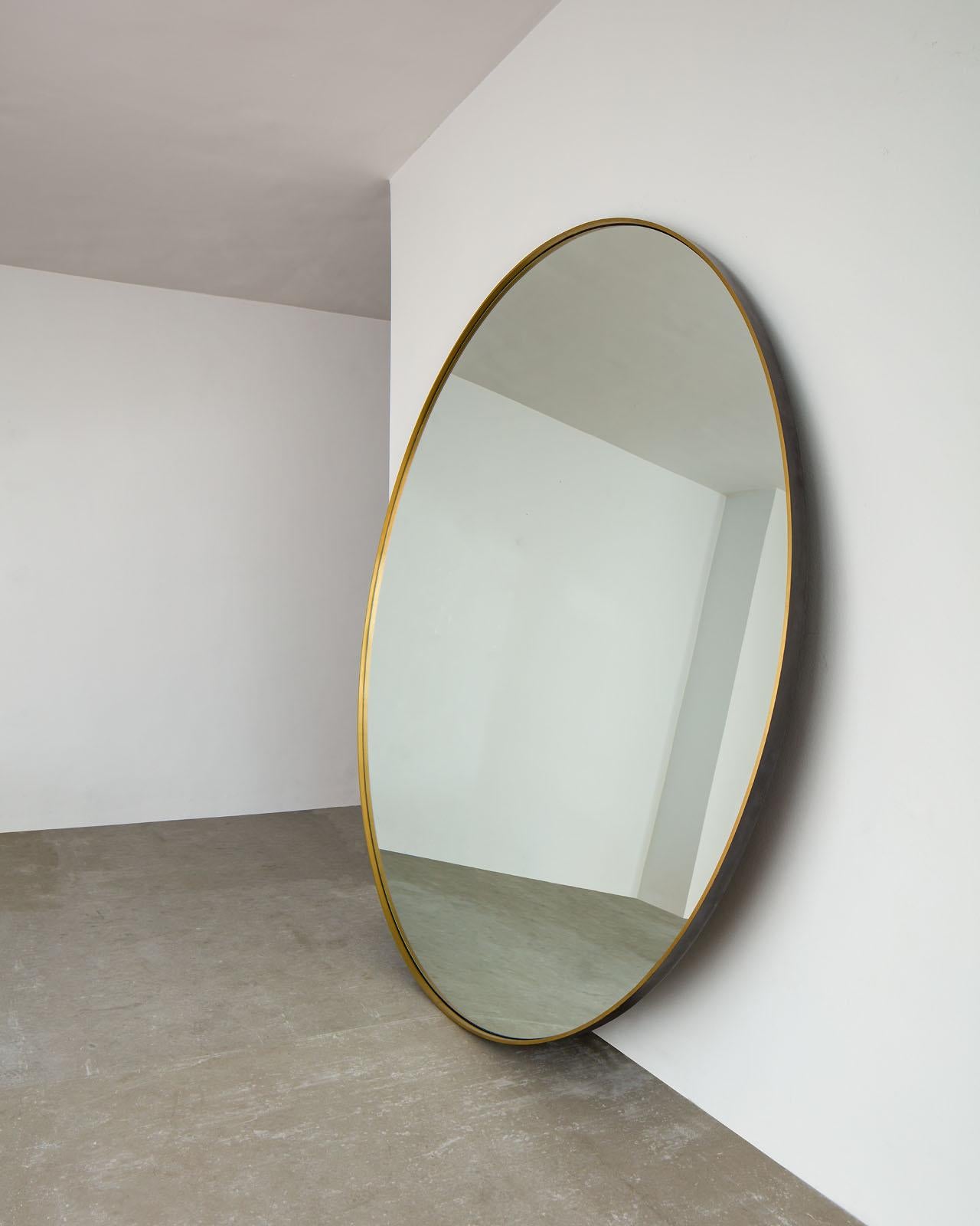 Decorate your workout space with this oversized leaning mirror. The circular shapes and scale are designed to fit the view of your entire body with extended arms and legs. The mirror can also help create your own sanctuary of peace for meditation or