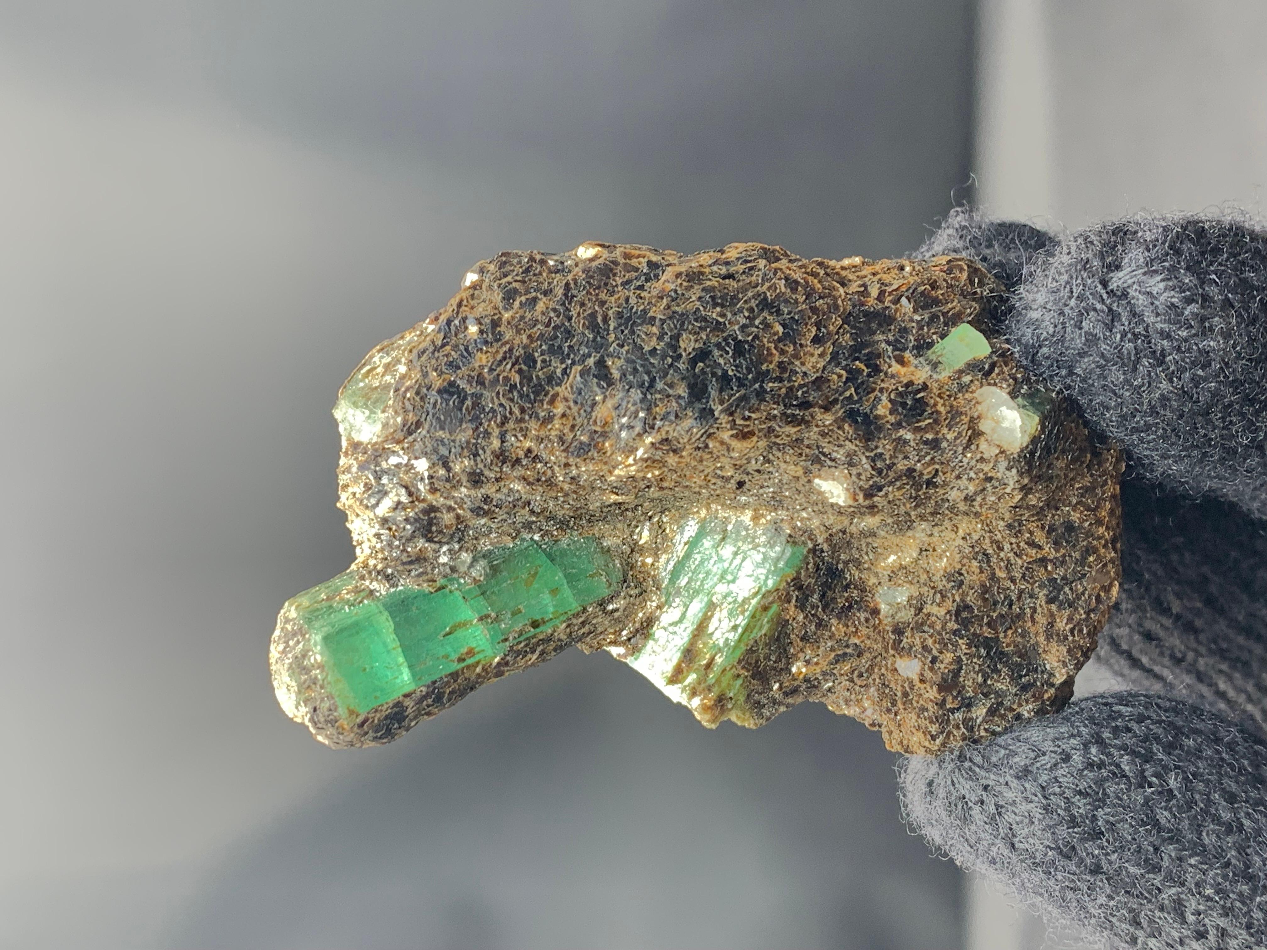 Contemporary 72 Grams Green Emerald Crystals Perched On Brownish Mica Matrix From Pakistan For Sale