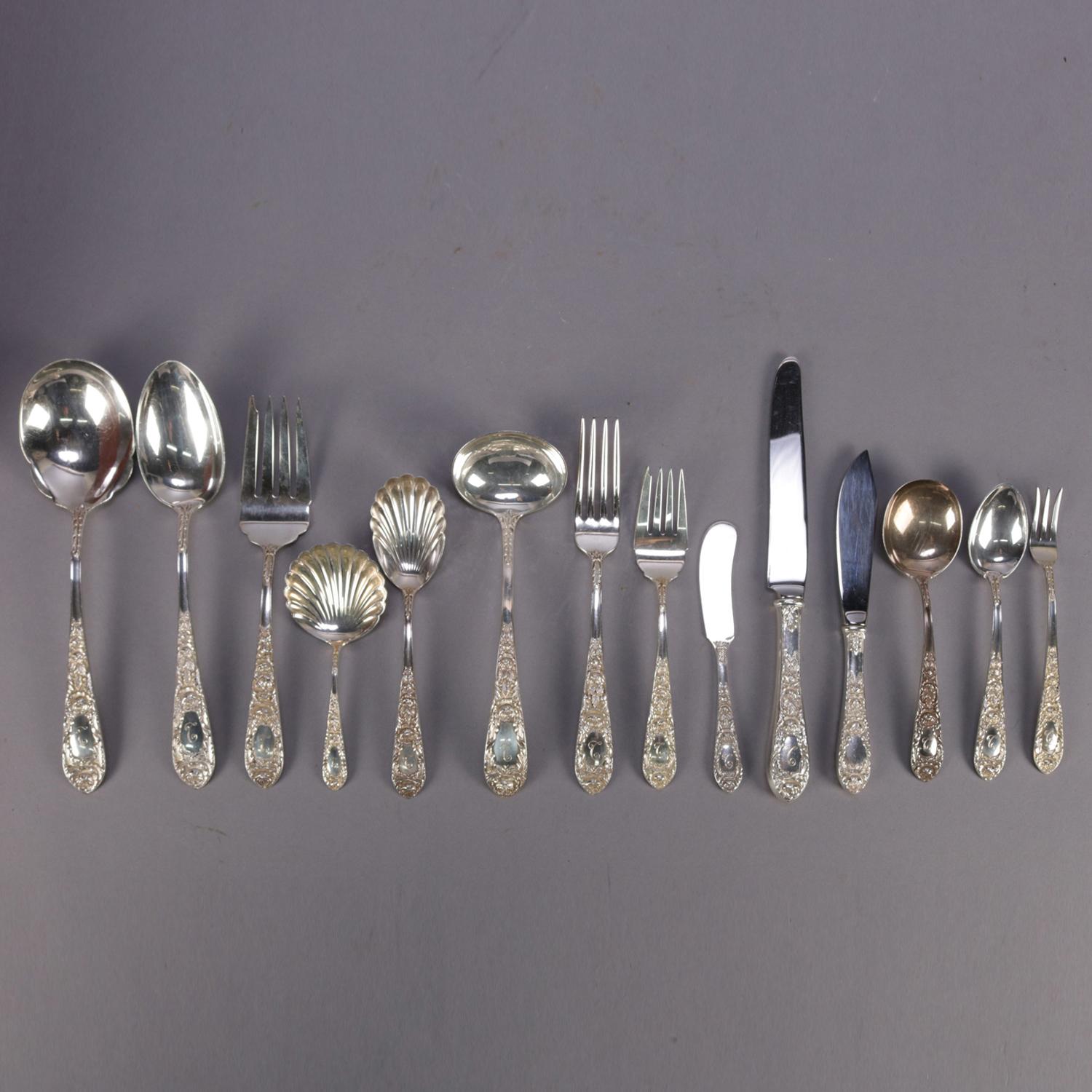 72 piece sterling silver flatware set by S. Kirk & Son Inc features the floral high relief Stieff Rose pattern with monogrammed 