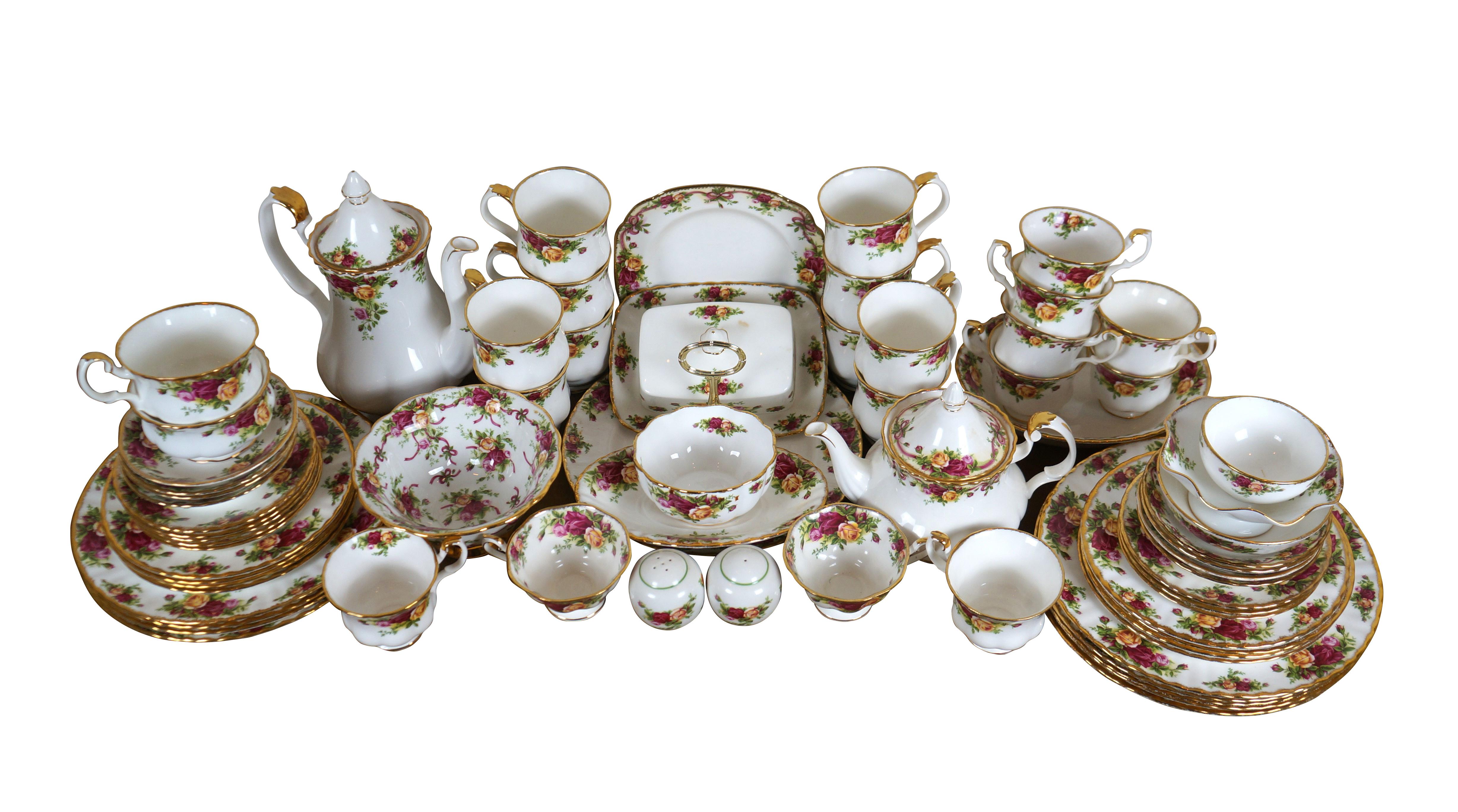 72 piece lot of Royal Albert Old Country Roses and Old Country Roses Ruby Celebration Ribbon Collection bone china dinnerware. Set includes: 23 Tea/Coffee Cups (Assorted Styles) , Salt & Pepper Shakers, 3 Custard Dishes (Assorted Styles), Coffee Pot