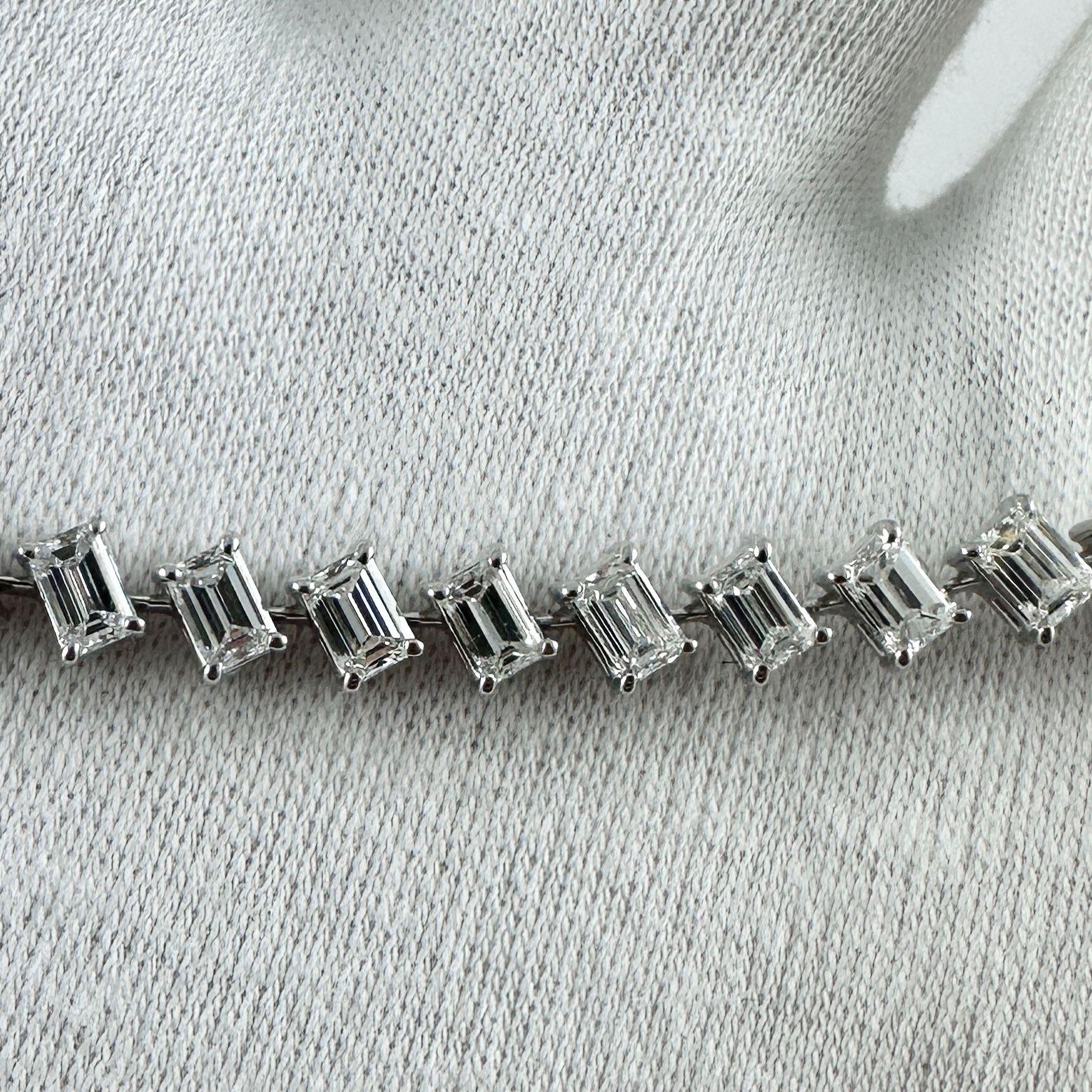 Refined and sophisticated, this emerald cut diamond tennis bracelet showcases the timeless beauty of step-cut diamonds, celebrated for their elegant lines and mirror-like sparkle. Crafted in 14K white gold, the bracelet features a total of 7.20