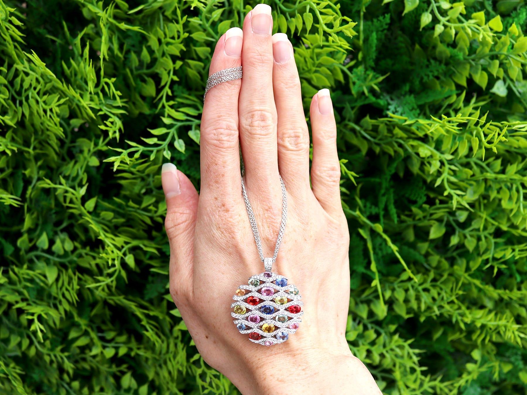 A stunning, fine and impressive contemporary 7.20 carat sapphire and 0.90 carat diamond, 18 karat white gold pendant; part of our diverse sapphire jewelry collection.

This stunning, fine and impressive multi colored sapphire pendant necklace has
