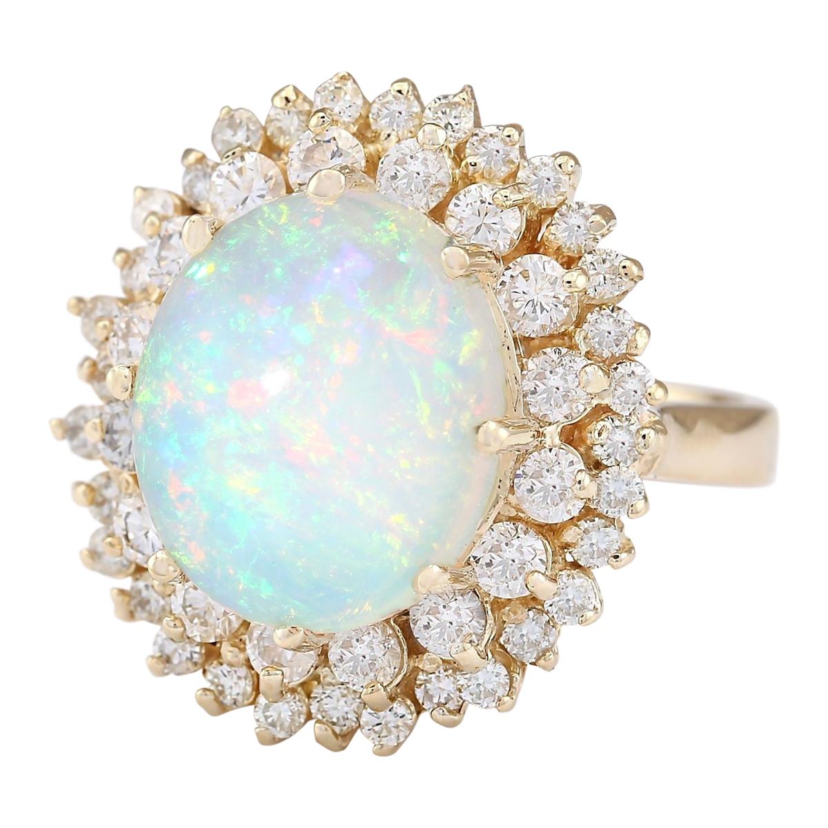 Stamped: 14K Yellow Gold
Total Ring Weight: 9.1 Grams
Total Natural Opal Weight is 5.50 Carat (Measures: 14.00x10.00 mm)
Color: Multicolor
Total Natural Diamond Weight is 1.70 Carat
Color: F-G, Clarity: VS2-SI1
Face Measures: 21.65x20.25 mm
Sku: