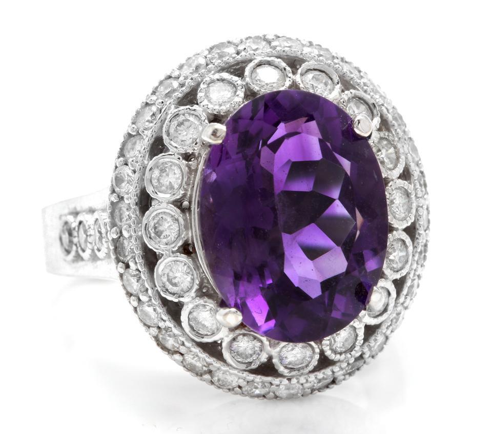 7.20 Carats Natural Amethyst and Diamond 14K Solid White Gold Ring

Total Natural Oval Shaped Amethyst Weights: Approx. 6.00 Carats

Amethyst Measures: Approx. 13 x 10mm

Natural Round Diamonds Weight: Approx. 1.20 Carats (color G-H / Clarity