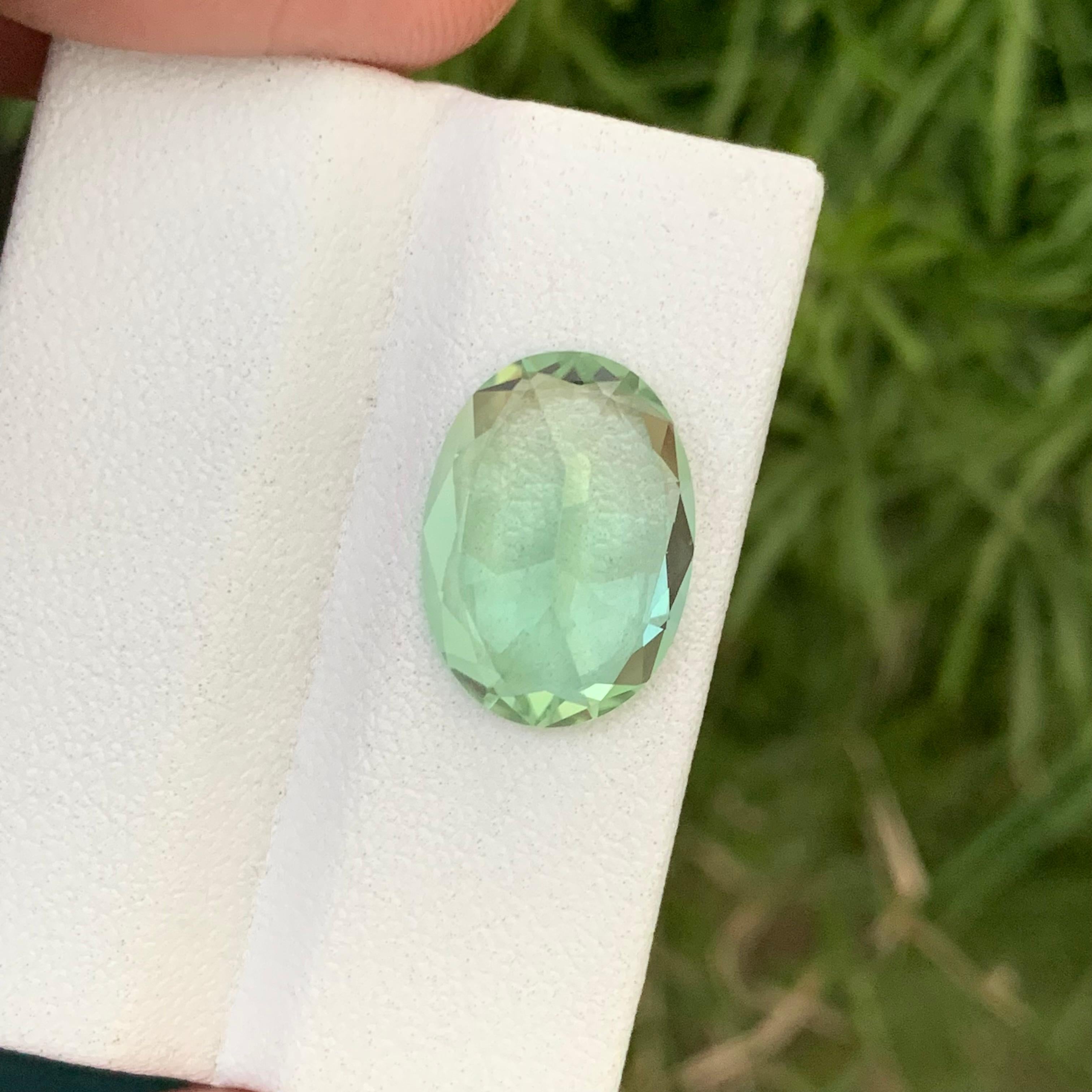 Loose Tourmaline 
Weight: 7.20 Carats 
Dimension: 15.3x11x6.9 Mm
Origin: Kunar Afghanistan 
Shape: Oval
Treatment: Non
Color; Mint Green
Certificate; On Customer Demand
Mint Green Tourmaline, a stunning variety within the Tourmaline family, exhibits