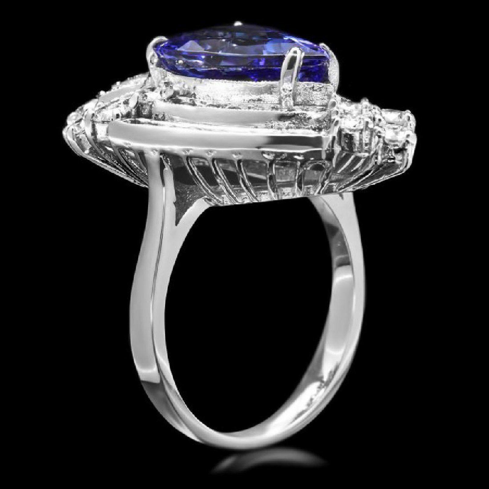 7.20 Carats Natural Very Nice Looking Tanzanite and Diamond 14K Solid White Gold Ring

Total Natural Pear Shaped Tanzanite Weight is: Approx. 5.00 Carats

Tanzanite Measures: Approx. 14.00 x 9.00mm

Natural Round Diamonds Weight: Approx. 2.20 Carats