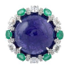 Bague en or 18 carats avec tanzanite, émeraude et diamant de 7,21 carats