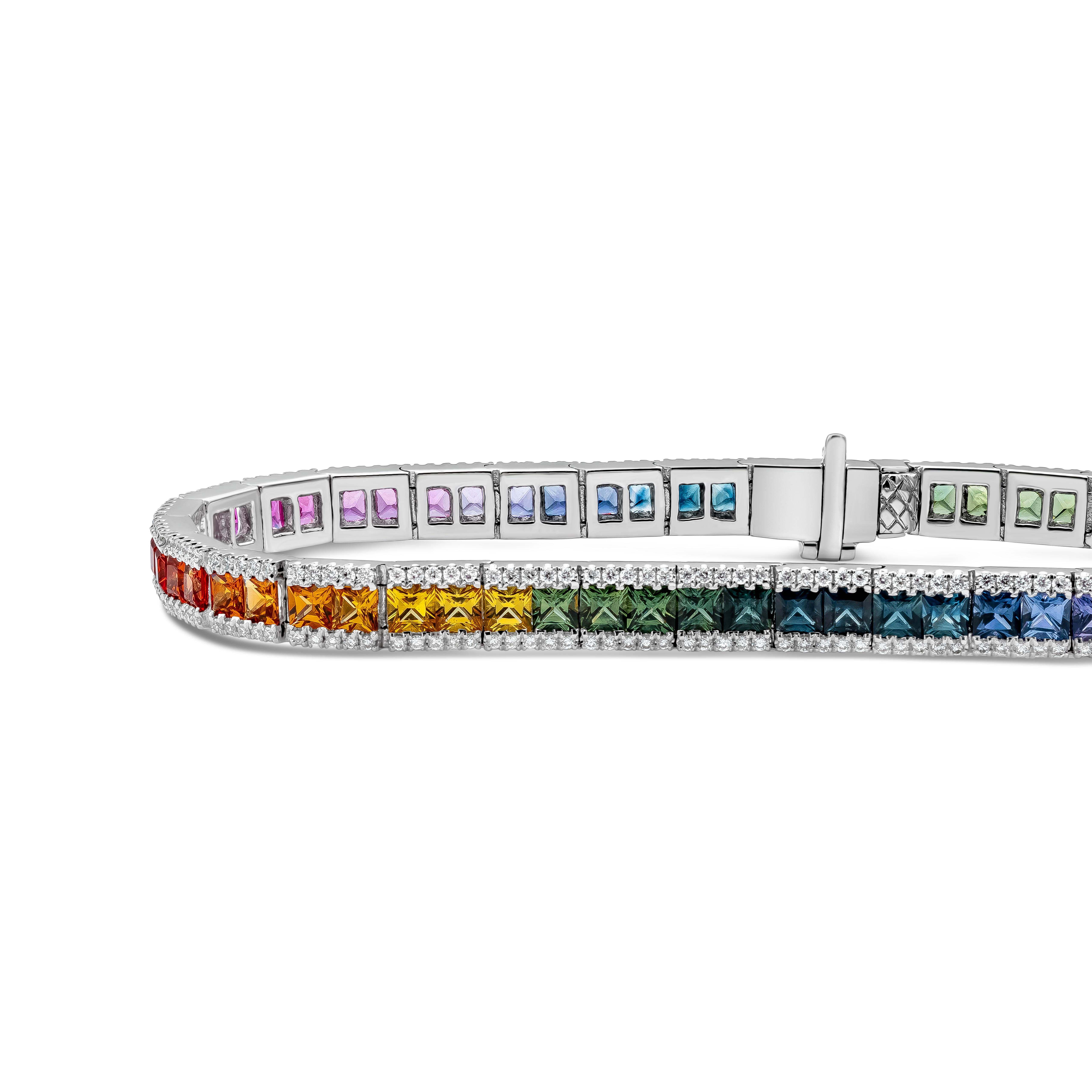 This simple and chic tennis bracelet showcasing a row of  multi color princess cut sapphires flanked with white round brilliant accents diamonds. Sapphires weighs 7.21 total carats. Accents diamonds are 348 pieces in total, weighs 0.91 total carats