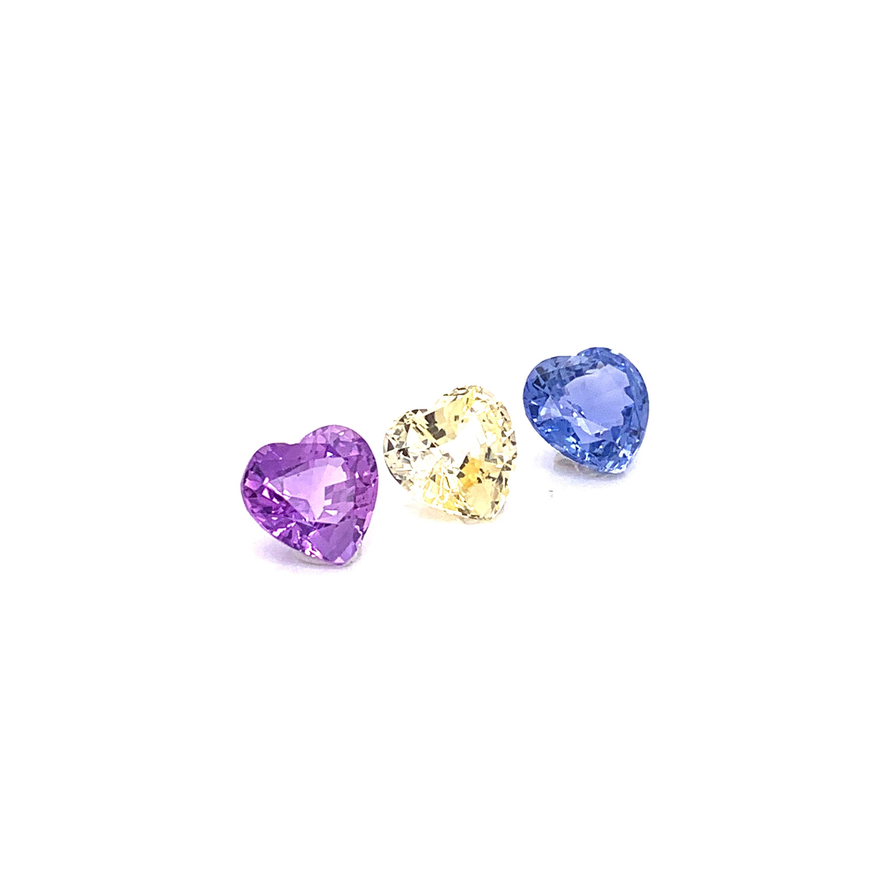 Contemporary 7.22 Carat Heart-Shaped Unheated Blue, Pink, and Yellow Sapphire Trio For Sale