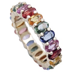 7.22 Carat Multiple Color Sapphire Eternity, 14 kt. Yellow Gold, Ring