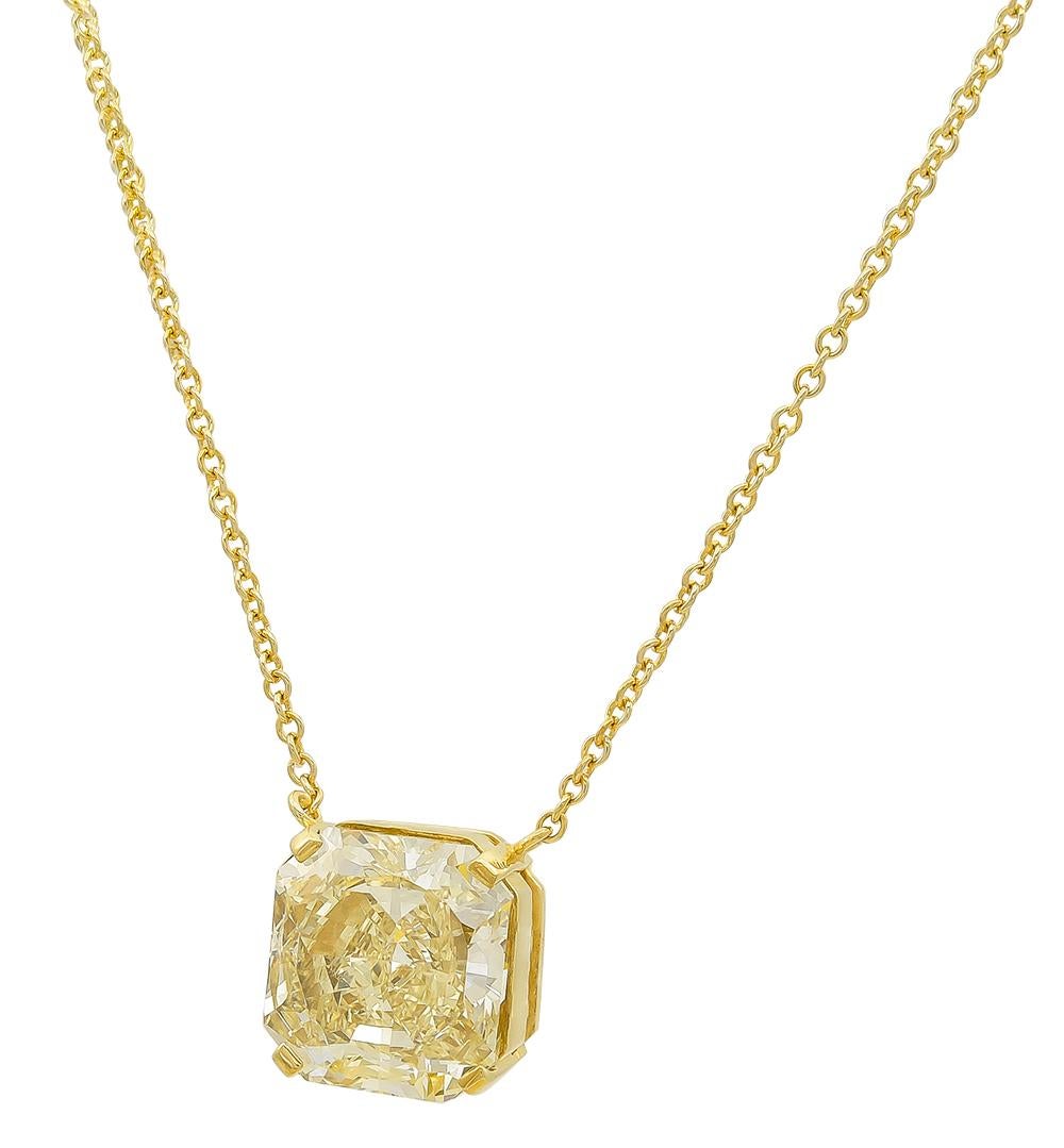 This necklace exuberates elegance through its exceptional 7.22 carat Natural Fancy Yellow, Radiant cut diamond. This magnificent stone sits on a 4 prong setting and is attached on a 16-inch Italian gold cable chain.
