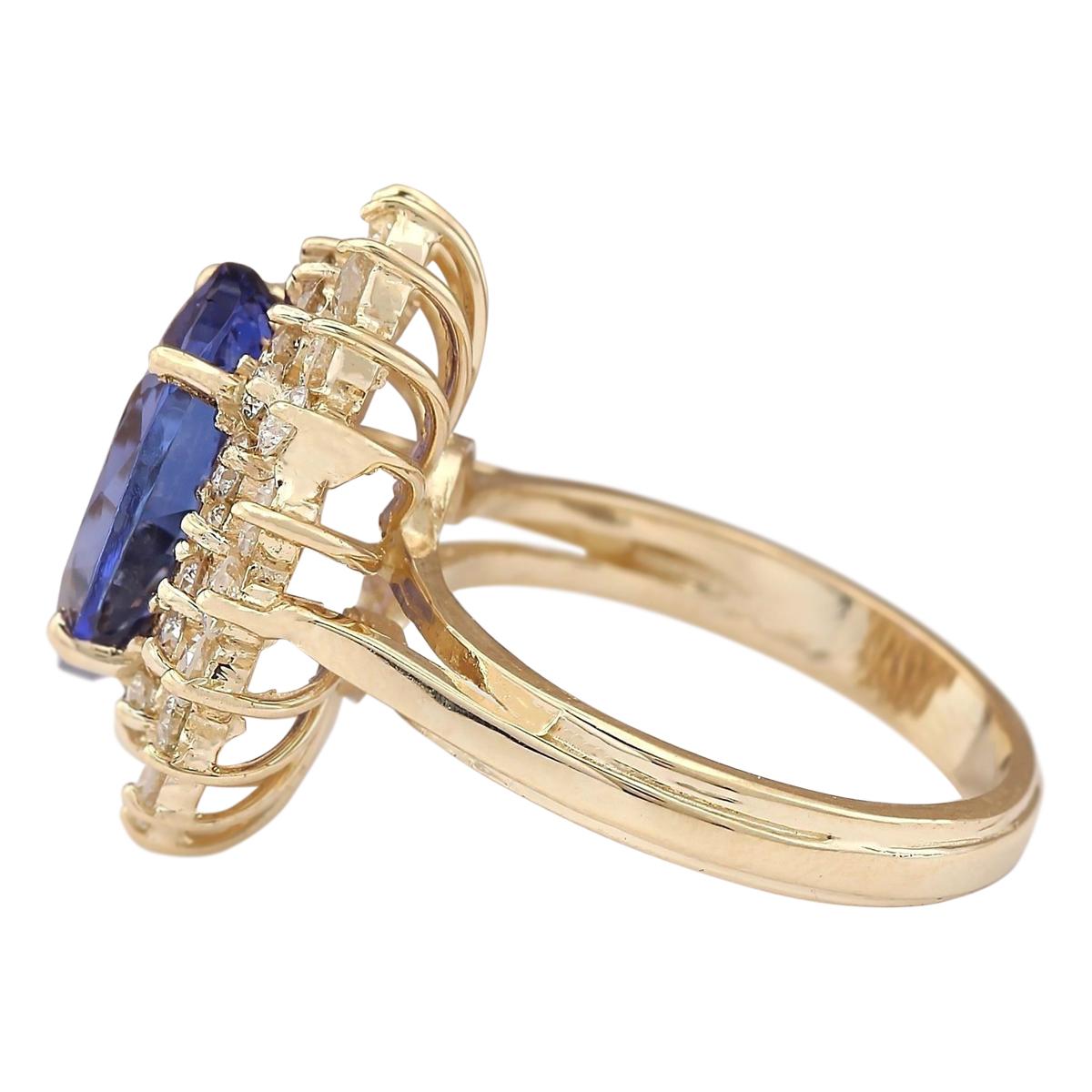 Elevate your look with our exquisite 7.22 Carat Tanzanite 14 Karat Yellow Gold Diamond Ring. Crafted from stamped 14K yellow gold, this ring boasts a total weight of 7.2 grams, ensuring both elegance and durability. The centerpiece is a mesmerizing