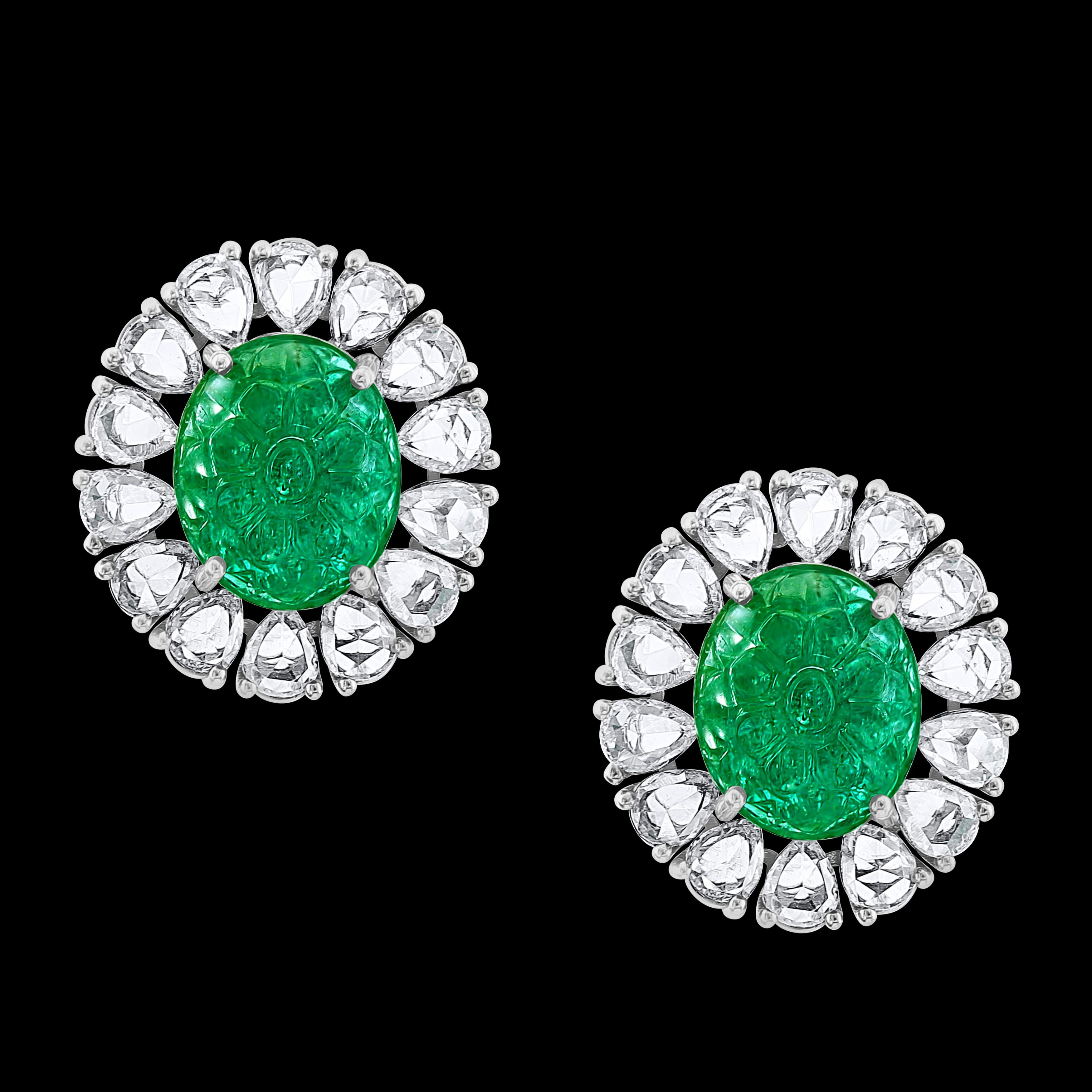 7.23 Ct Carved Emerald  &  2.9 Ct Rose cut Diamond Earrings 18 Karat White Gold

 Emerald  Diamond  Post  Earrings  18 Karat  white Gold 
Two fine carved emeralds of total 7.23 ct weight
Emeralds are surrounded by pear shape rose cut diamonds 
Total