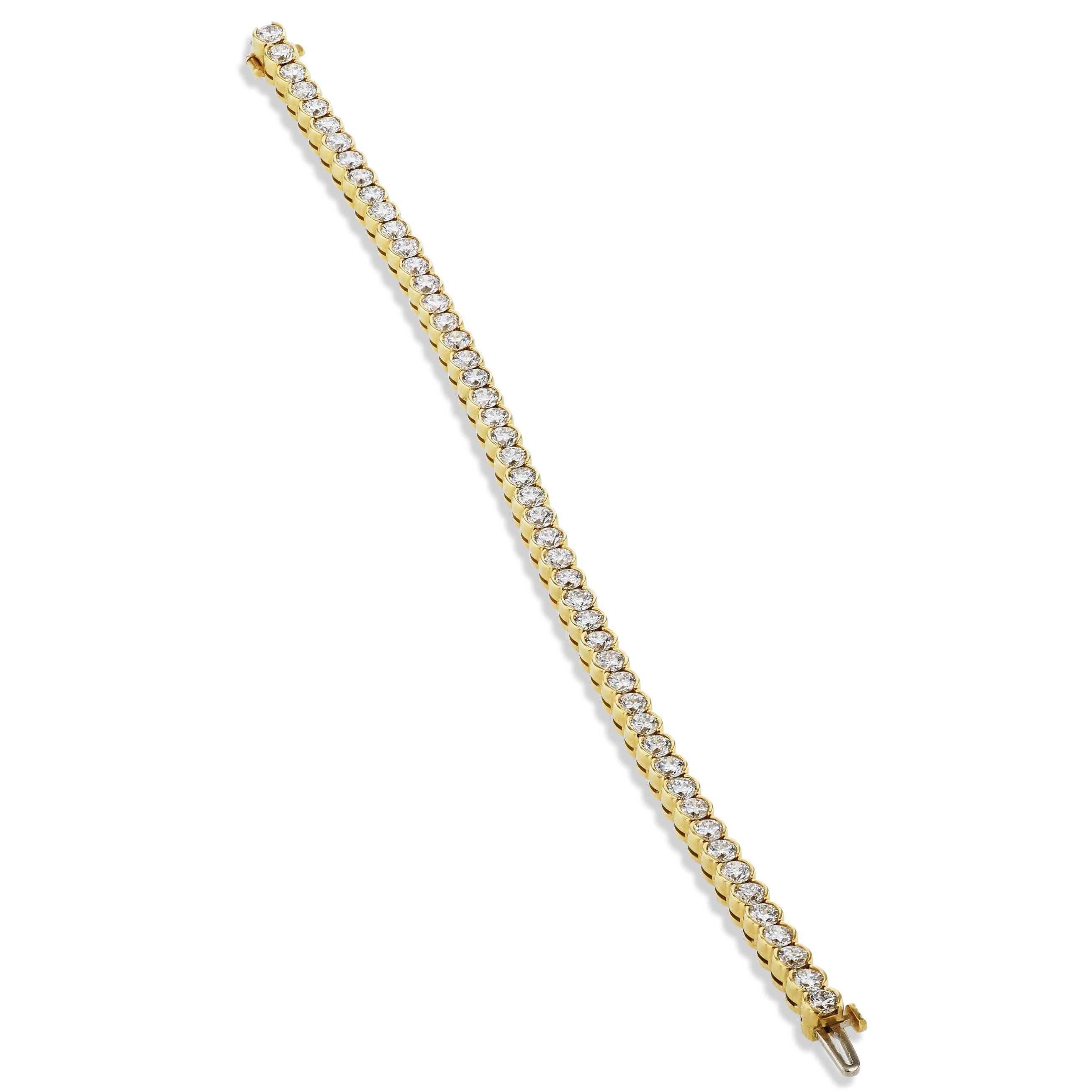 
This stunning 18kt Yellow Gold Tennis Bracelet from the H&H Collection showcases 7.24 carats of  Diamonds, semi-bezel set and handcrafted for a lavish look!
7 inches in length.

-Diamond  Yellow Gold Tennis Bracelet.
-18kt Yellow Gold.
-Tennis