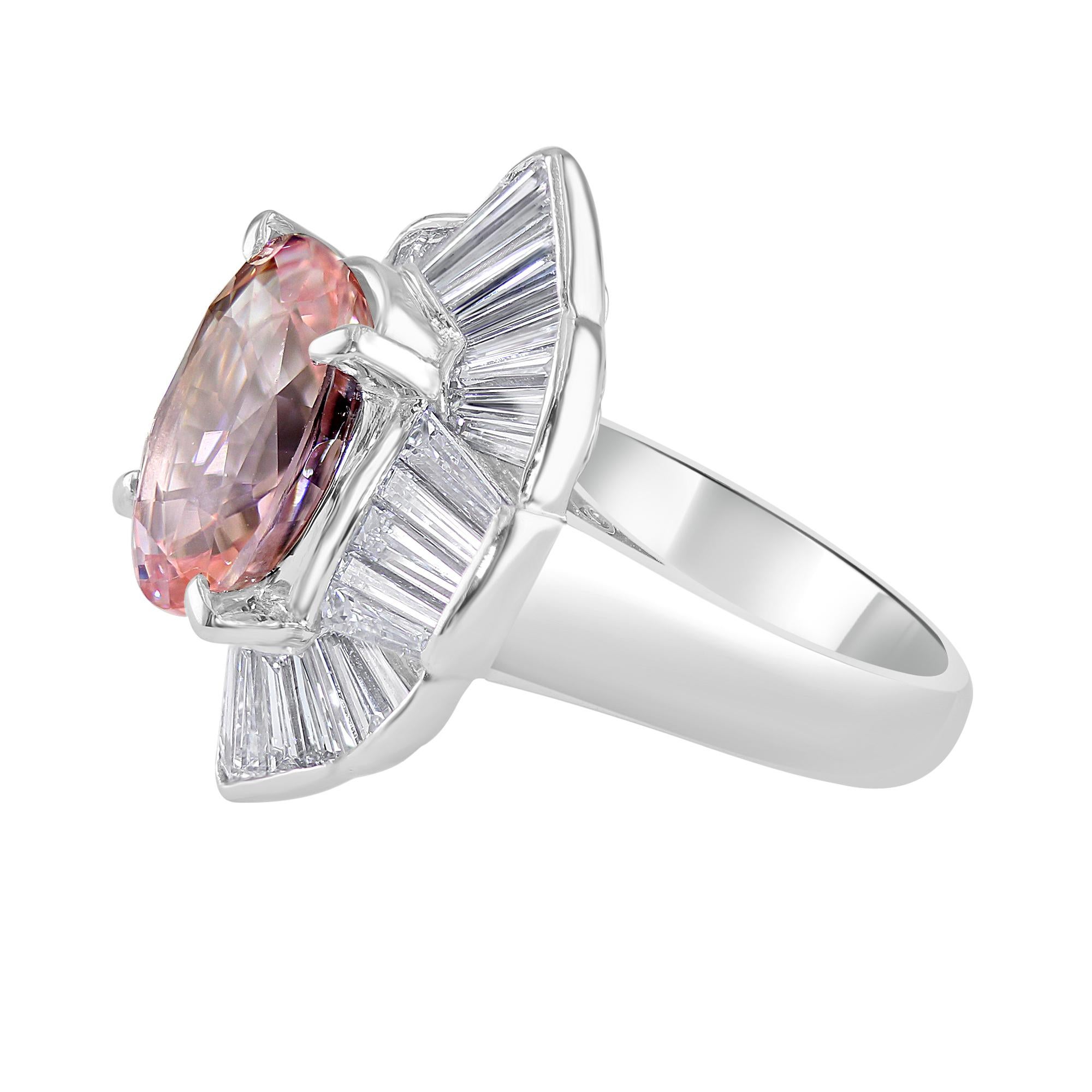 7.24ct GRS certified Oval Padparadscha Ballerina Ring, complimented by 2.59 ct total weight, Baguette Diamonds.
Beautiful, elegant and delicate ring, that shines in every angle. Perfect one-of-a-kind accessory for any occasion. 
Set in Platinum. 