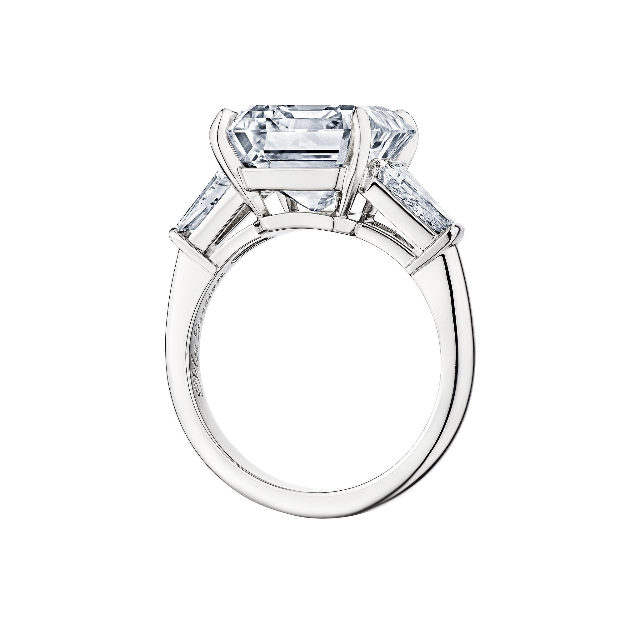 Innately stately and incomparable, this 7.52 carat emerald cut diamond platinum engagement ring is simply intoxicating.  E color.  VVS1 clarity.  GIA certification number 2221955789.  Side tapered diamond baguettes total diamond weight .85 carats. 