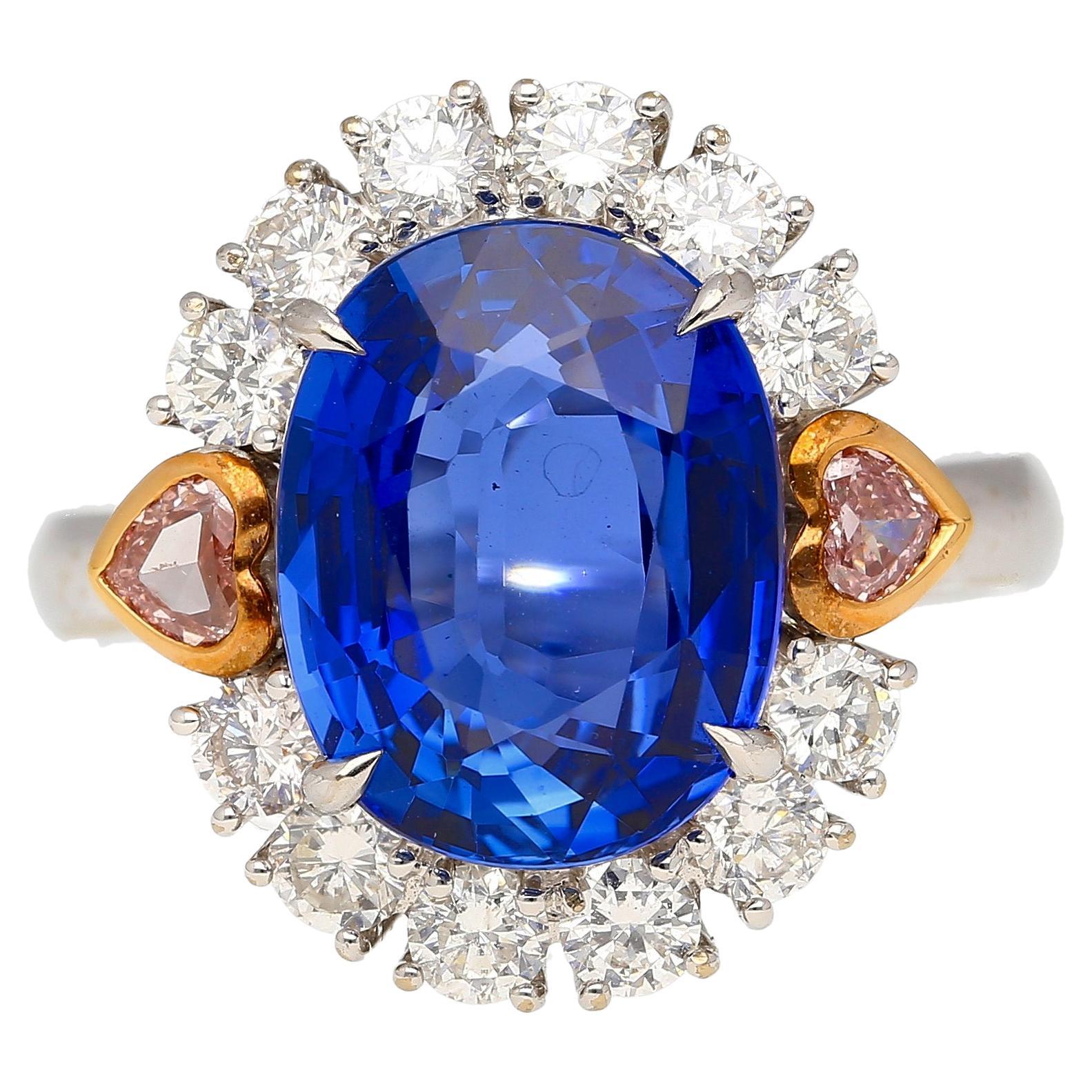 7.25 Carat No Heat Oval Cut Blue Sapphire Ring With Pink Diamond Side Stones For Sale