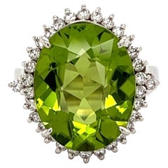 7.25 Carat Oval Peridot and Diamond Platinum Ring Estate Fine Jewelry