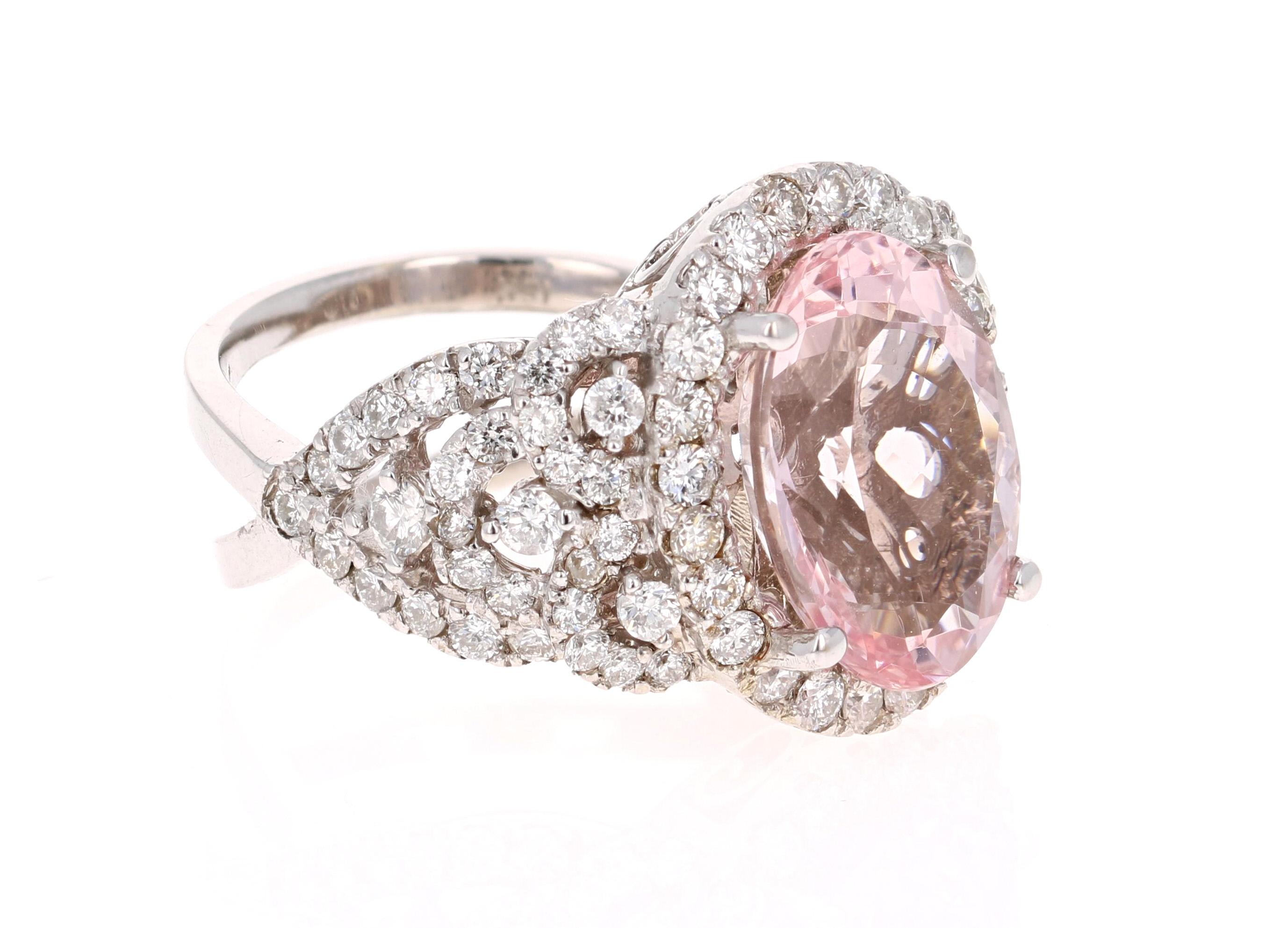 
This Morganite ring has a gorgeous 5.50 Carat Oval Cut Pink Morganite and is surrounded by 88 Round Cut Diamonds that weigh 1.75 Carats. The diamonds have a clarity and color of SI-F. The total carat weight of the ring is 7.25 Carats. 

It is