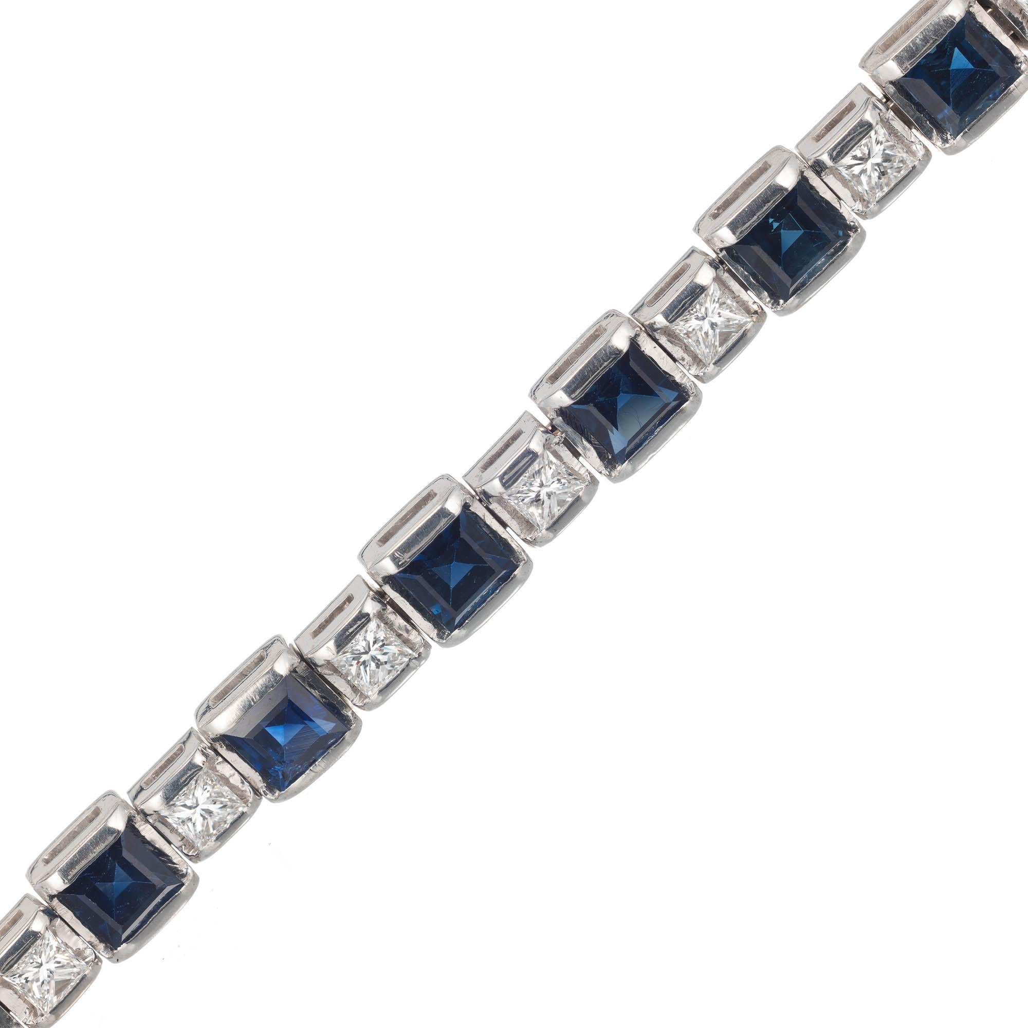  Hinged link square blue Sapphire and bright white sparkly Princess cut Diamonds 14k white gold bracelet. Bar set, no prongs to catch.

18 square fine bright blue Sapphires, approx. total weight 7.25cts, VS1 – SI1 
17 Princess cut Diamonds, approx.