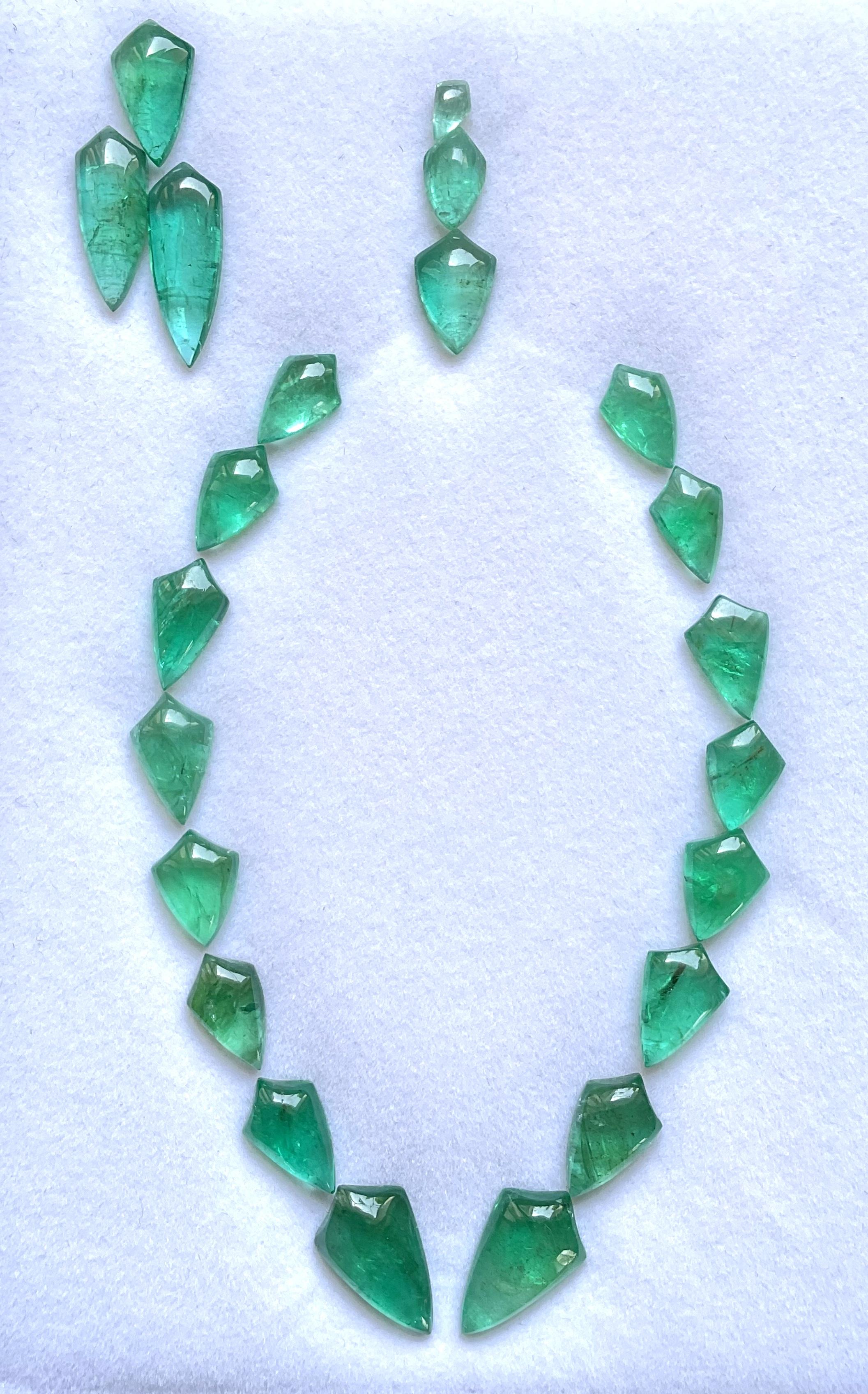 Shield Cut 72.50 carats Zambian Emerald Shield Pair cabochon Layout Jewelry Natural Gems For Sale