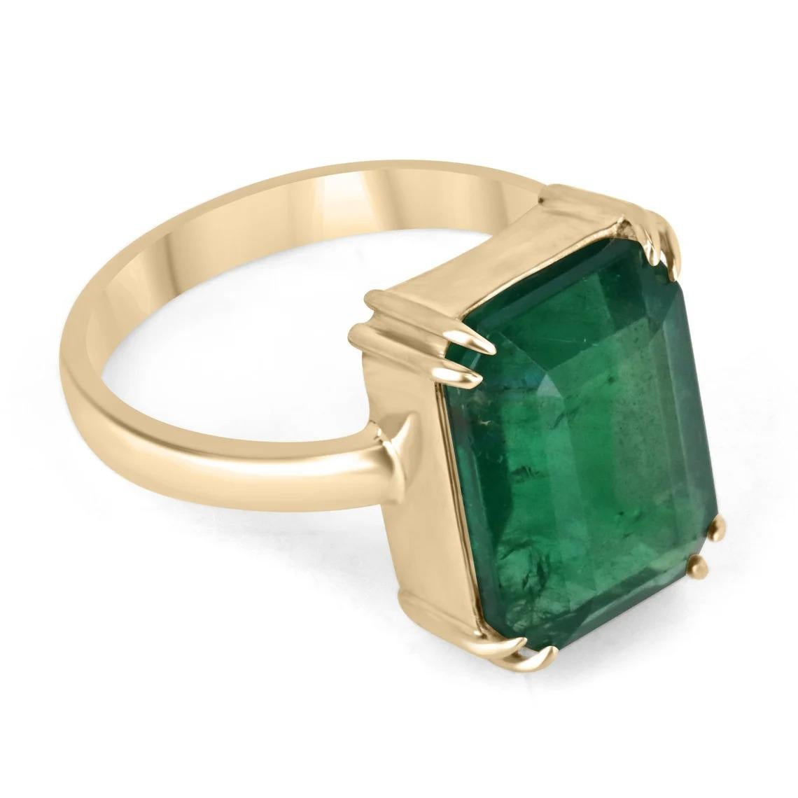Displayed is a classic emerald solitaire engagement or right-hand ring. This spectacular piece features a remarkable 7.25-carat, natural emerald cut emerald from the origins of Zambia. The center stone showcases a rich green color that enthralls at
