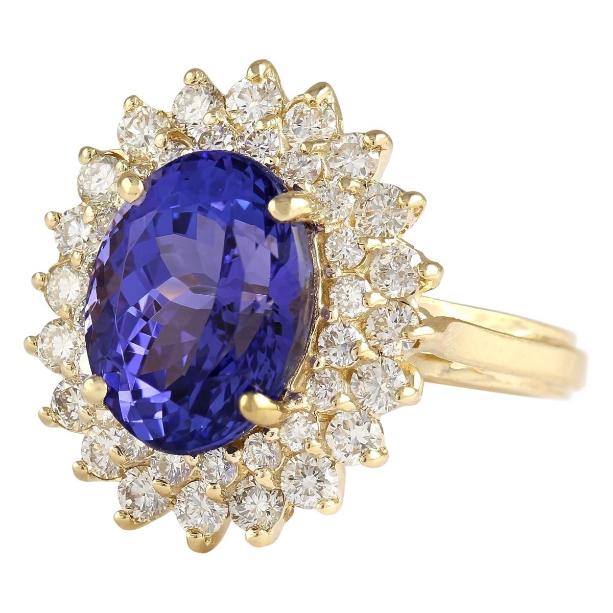 Stamped: 14K Yellow Gold
Total Ring Weight: 6.0 Grams
Total  Tanzanite Weight is 5.96 Carat (Measures: 12.00x10.00 mm)
Color: Blue
Total  Diamond Weight is 1.30 Carat
Color: F-G, Clarity: VS2-SI1
Face Measures: 19.65x17.12 mm
Sku: [704130W]
