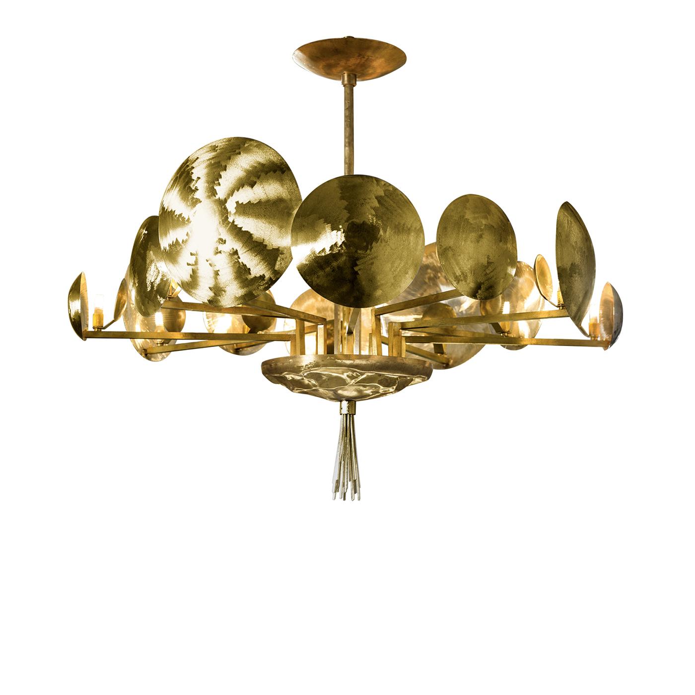 This piece will be a sophisticated and luxurious addition to any room in the home and it is the all gold version of the 7260 Chandelier which also features elements with a nickel finish. A central component with a round shape supports a series of