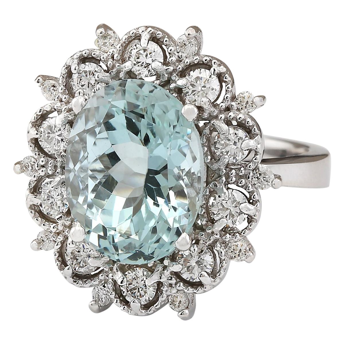 7.27 Carat Natural Aquamarine 14 Karat White Gold Diamond Ring
Stamped: 14K White Gold
Total Ring Weight: 8.1 Grams
 Aquamarine Weight is 6.52 Carat (Measures: 12.00x10.00 mm)
Diamond Weight is 0.75 Carat
Color: F-G, Clarity: VS2-SI1
Face Measures: