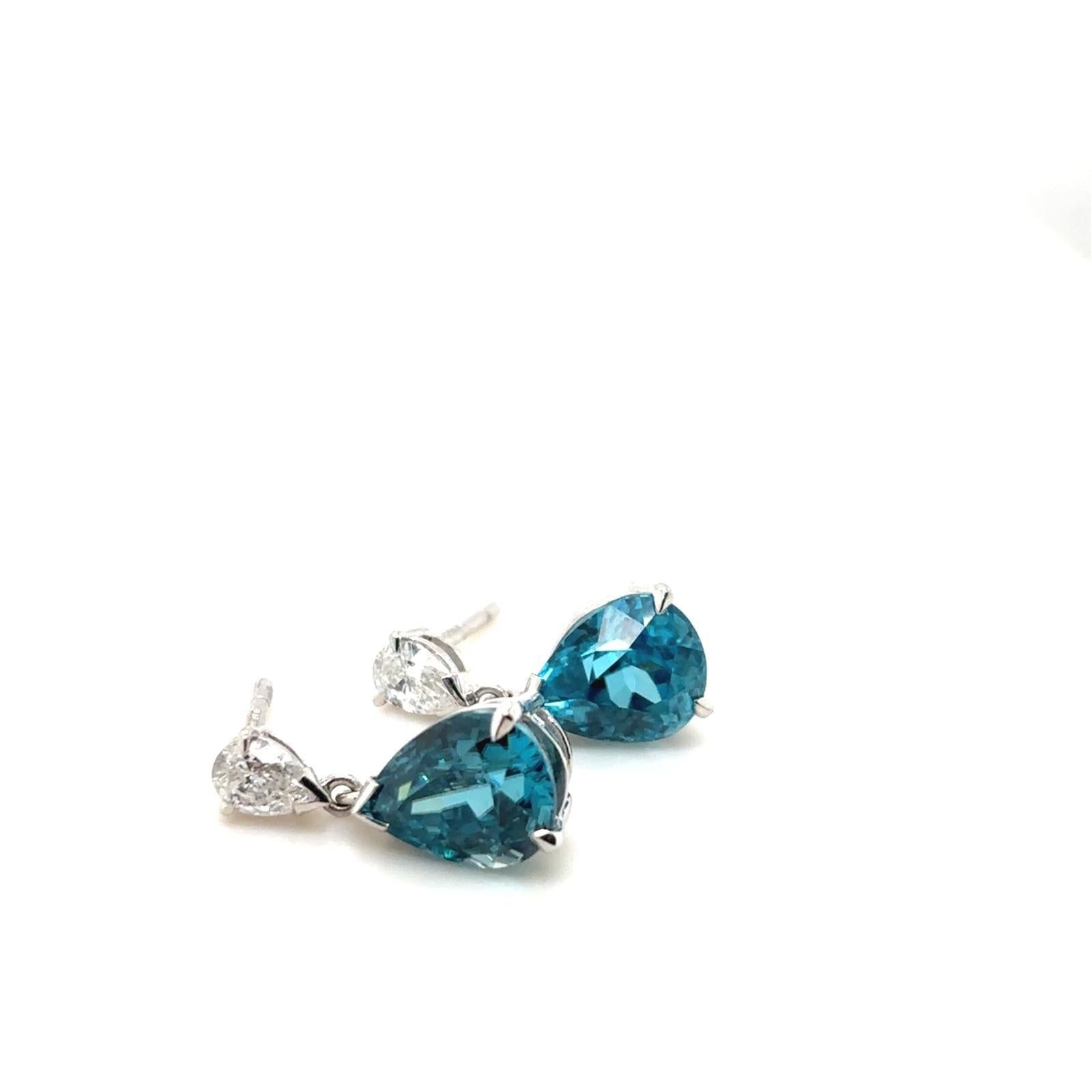 A pair of 7.27 carat blue zircon and diamond pear on pear drop earrings in platinum

Each earring is set with a pear cut blue zircon totalling 7.27 carats suspended from a matching pear brilliant cut diamonds totalling 0.50 carats.

The blue zircons