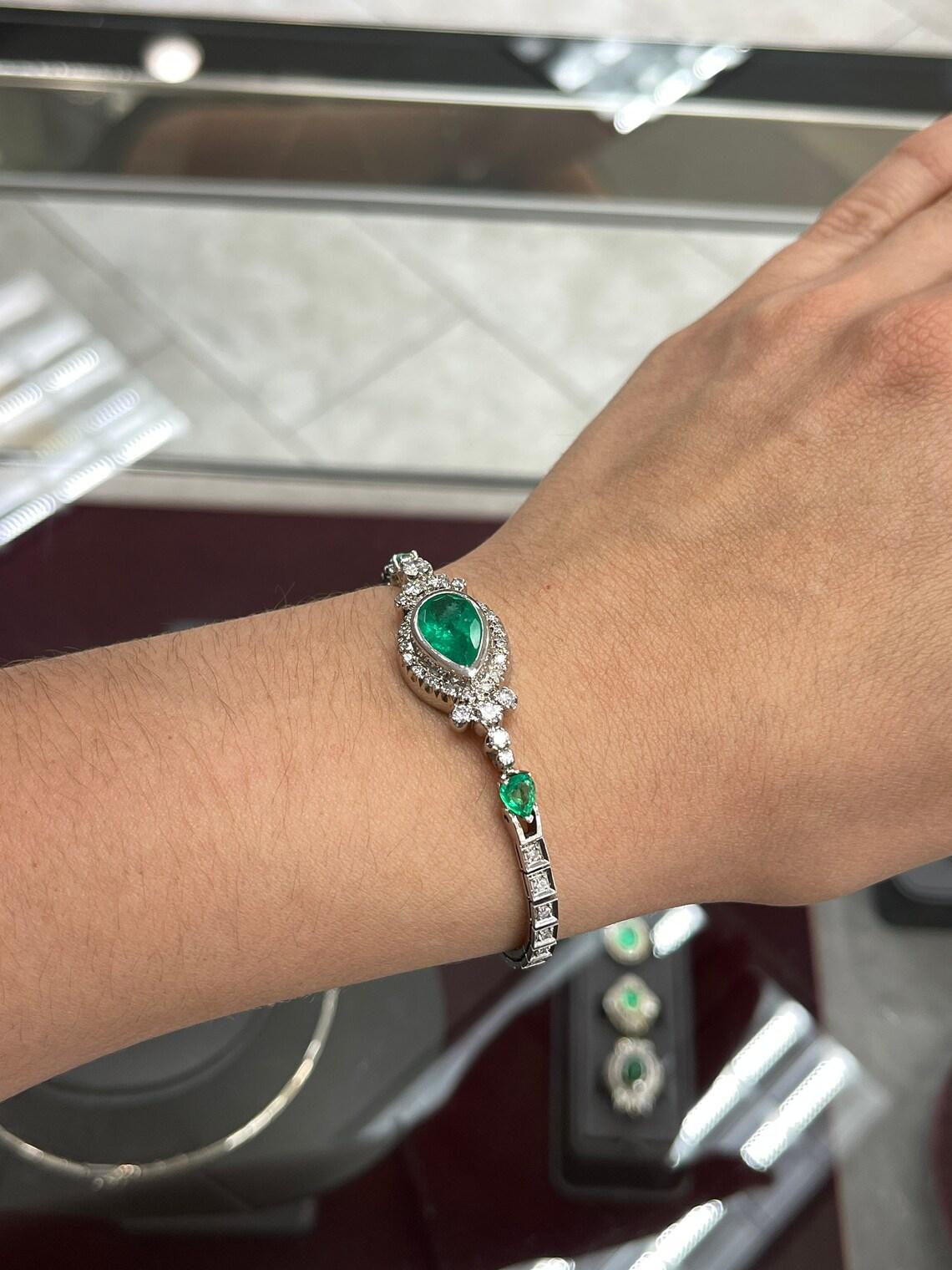 Modern 7.27tcw Colombian Emerald & Diamond 14K Vintage Pear Cut Bracelet Gold Bangle For Sale