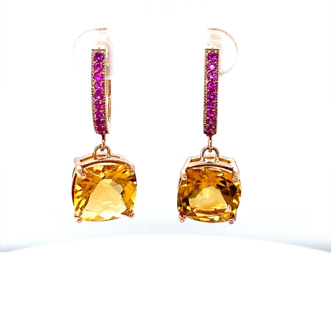 7.28 Carat Citrine Pink Sapphire Rose Gold Drop Earrings

These lovely Earrings have 2 vibrant Cushion Cut Citrine Quartz that weigh 6.99 carats.  The huggies have 20 0 Round Cut Pink Sapphires that weigh 0.29 carats. The total carat weight of the