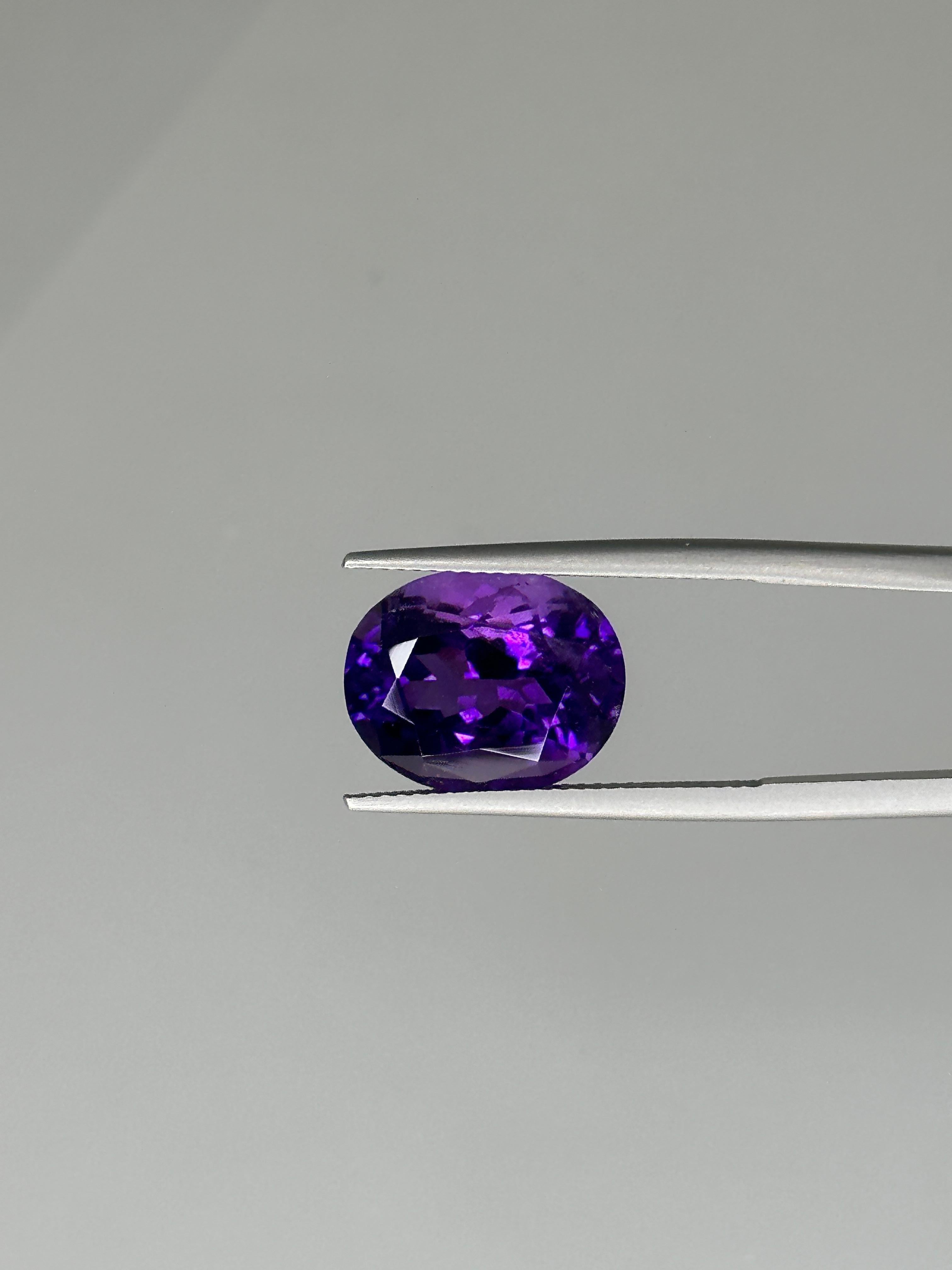 Wonderful Amethyst. Classic Zambian material. Imbued with a superb color.

7.28 carat Oval Deep Purple Amethyst
Shape: Oval
Crown: Modified Brilliant
Pavilion: Modified Brilliant
Dimensions: 14.20 x 11.43 x 8.40 mm
Color: Deep Purple
Weight: 7.28