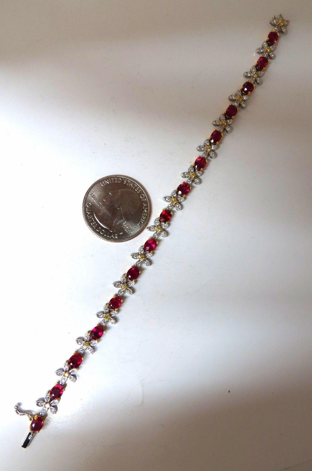 Ruby & Flower Tennis.

6.68ct. Natural ruby bracelet.

Oval, full cuts 

Clean clarity

Transparent & Vivid Reds.

Average 4 x 5mm each

.40ct Natural Diamonds

Rounds & full cuts

Vs-2 clarity G color

.20ct Natural Fancy Yellow Diamonds.

18kt.