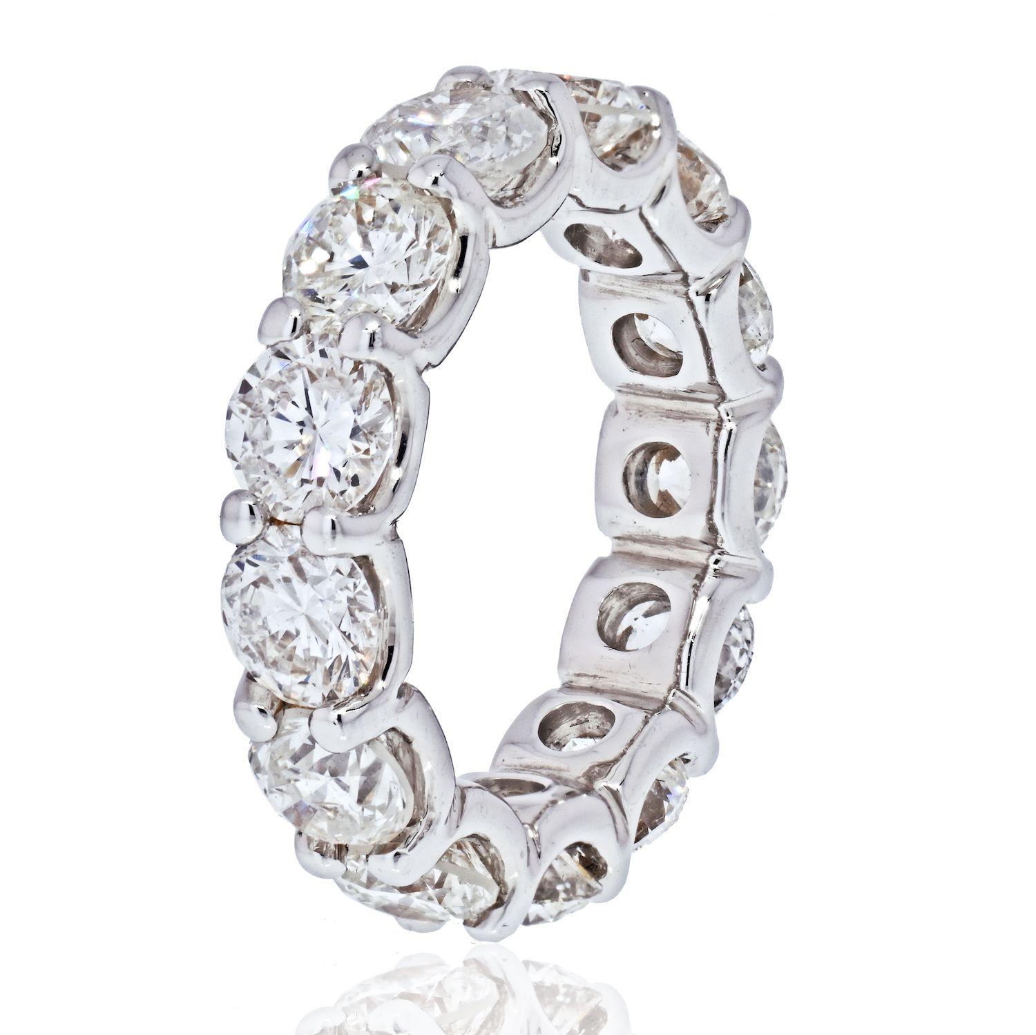 There are 13 diamonds in this lovely eternity band that was handcrafted in 14k white gold making it durable and stunning. On average G-H color clean SI clarity stones. 
Low setting. Brilliant all around.
Smooth inside finish. 
Ring Width: 5mm,
