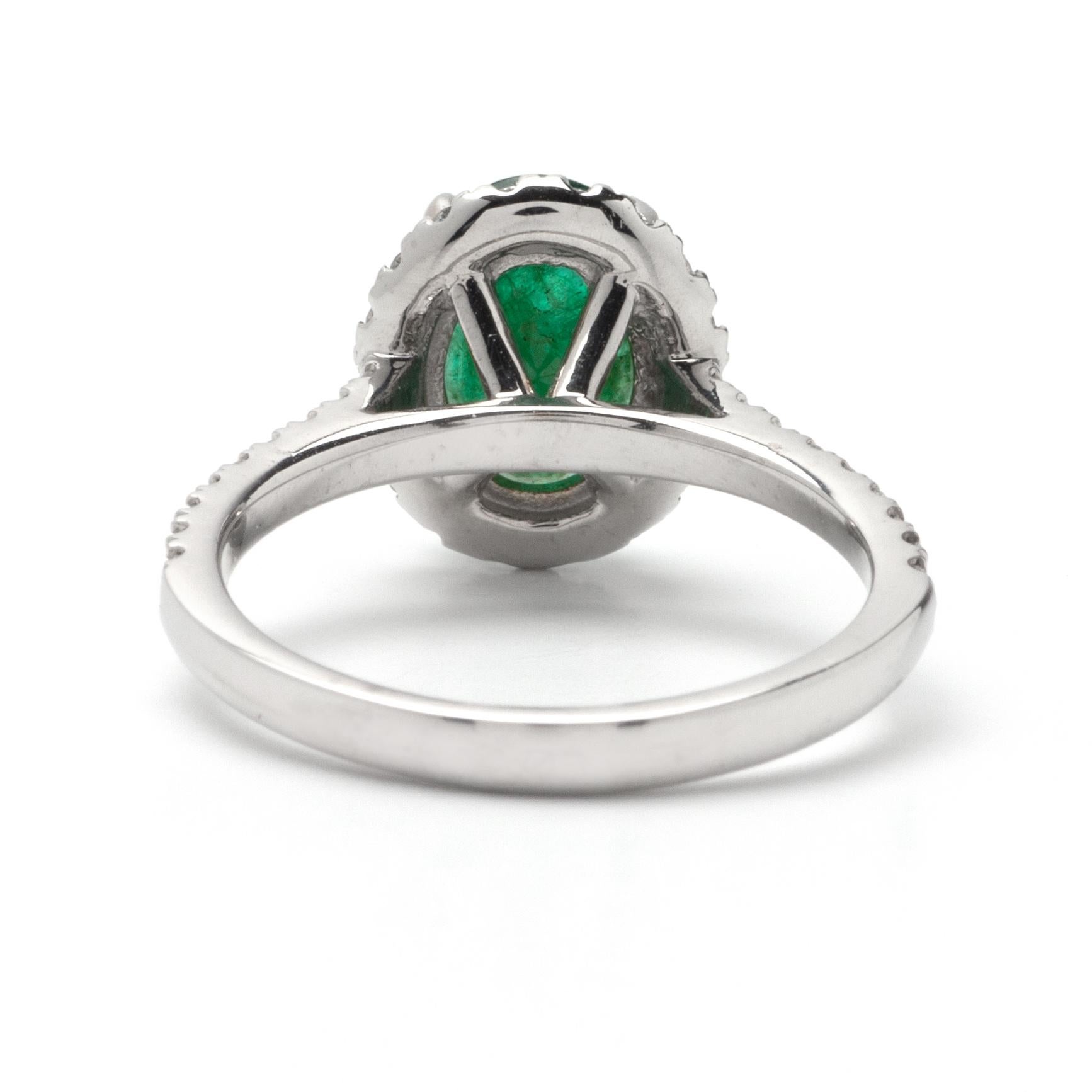 Modern 1.77ct Emerald Halo Ring in 14K White Gold; 0.50ct Side Diamonds For Sale
