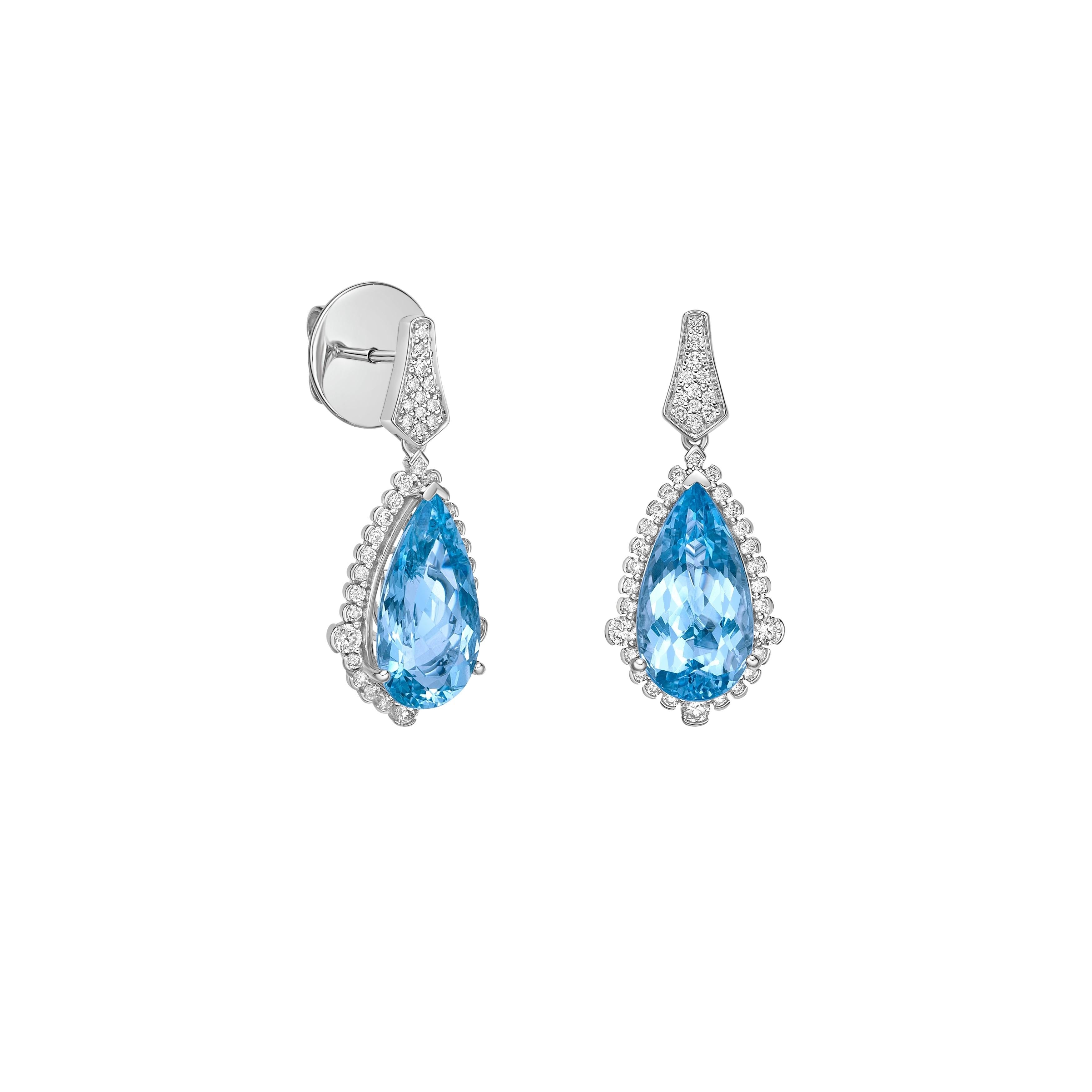 Elevate your look with our stunning Santa Maria aquamarine set, featuring a mesmerizing ice blue hue that radiates elegance. Enhanced with diamonds and crafted in white gold, these drop earrings offer a timeless allure with a touch of modern