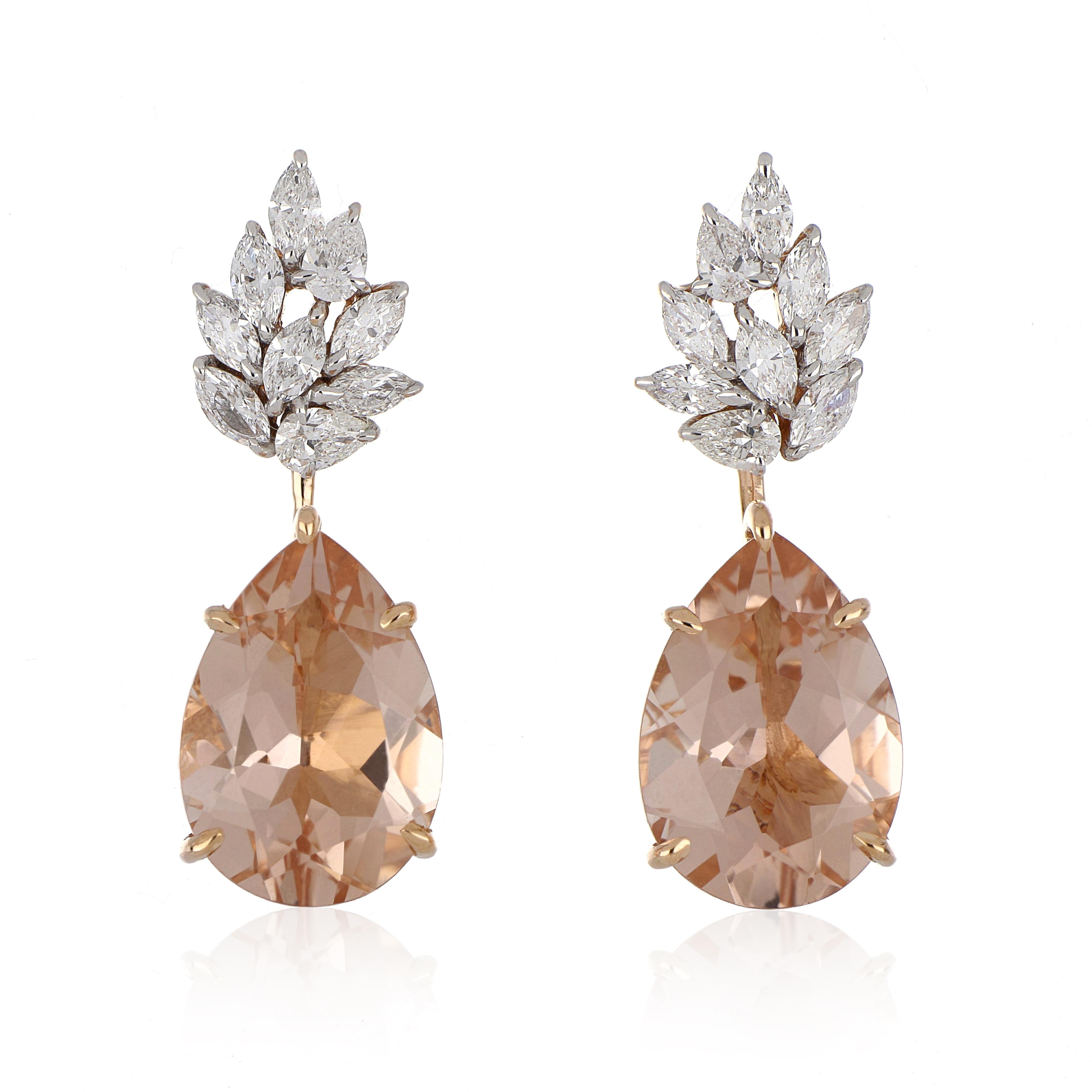 Elegante und exquisit detailliert Gold Ohrringe, mit 6,85 Ct Pear Cut Morganites Paar mit Marquise Diamanten akzentuiert, mit einem Gewicht von ca. 0,92 Ct. insgesamt Karat Gewicht. Wunderschön handgefertigt in 18 Karat Roségold.

Stein Größe: