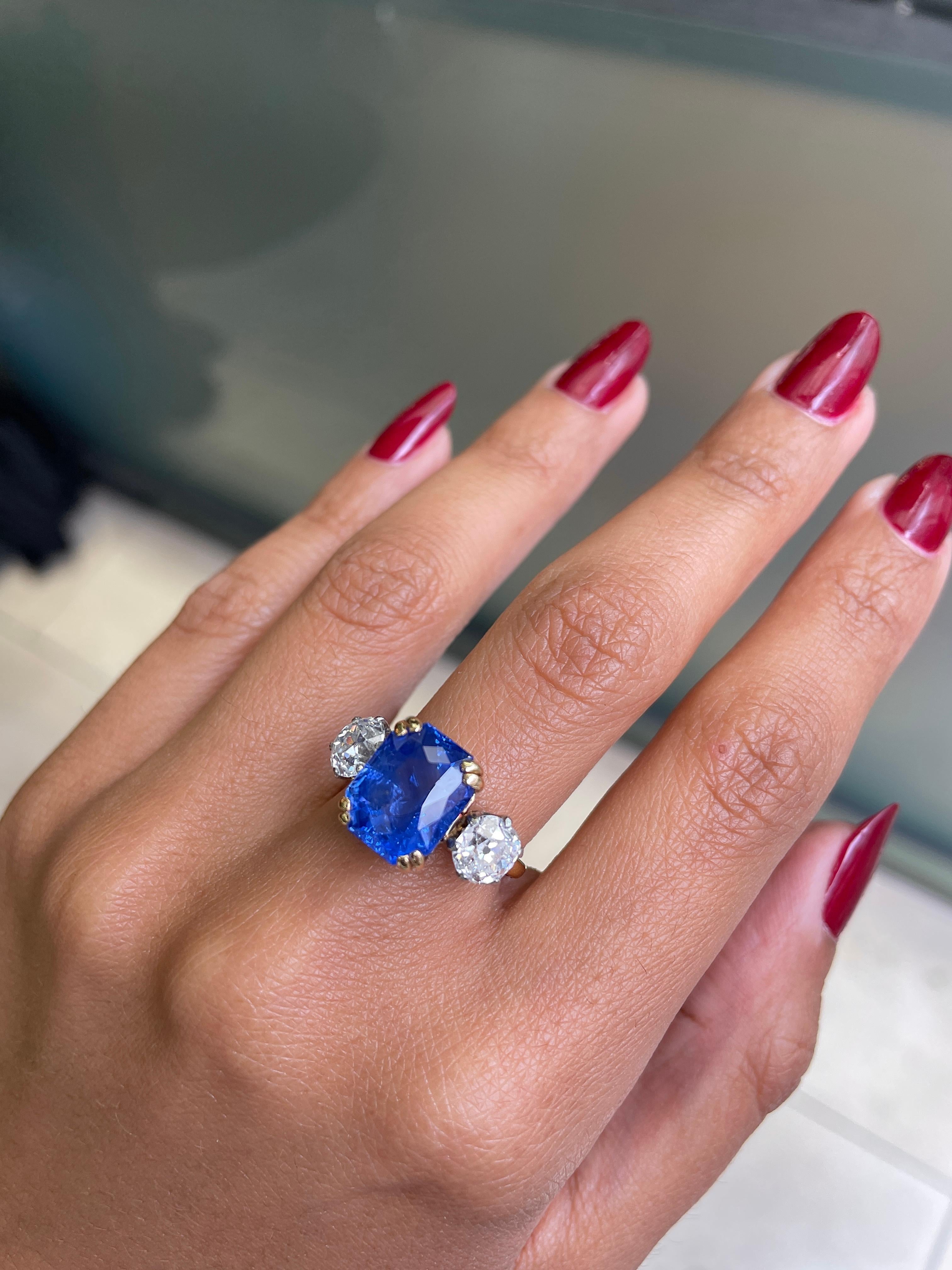 Old Mine Cut 7.29 Carat Natural Unheated Sapphire and Old Cut Diamond Three-Stone Ring For Sale