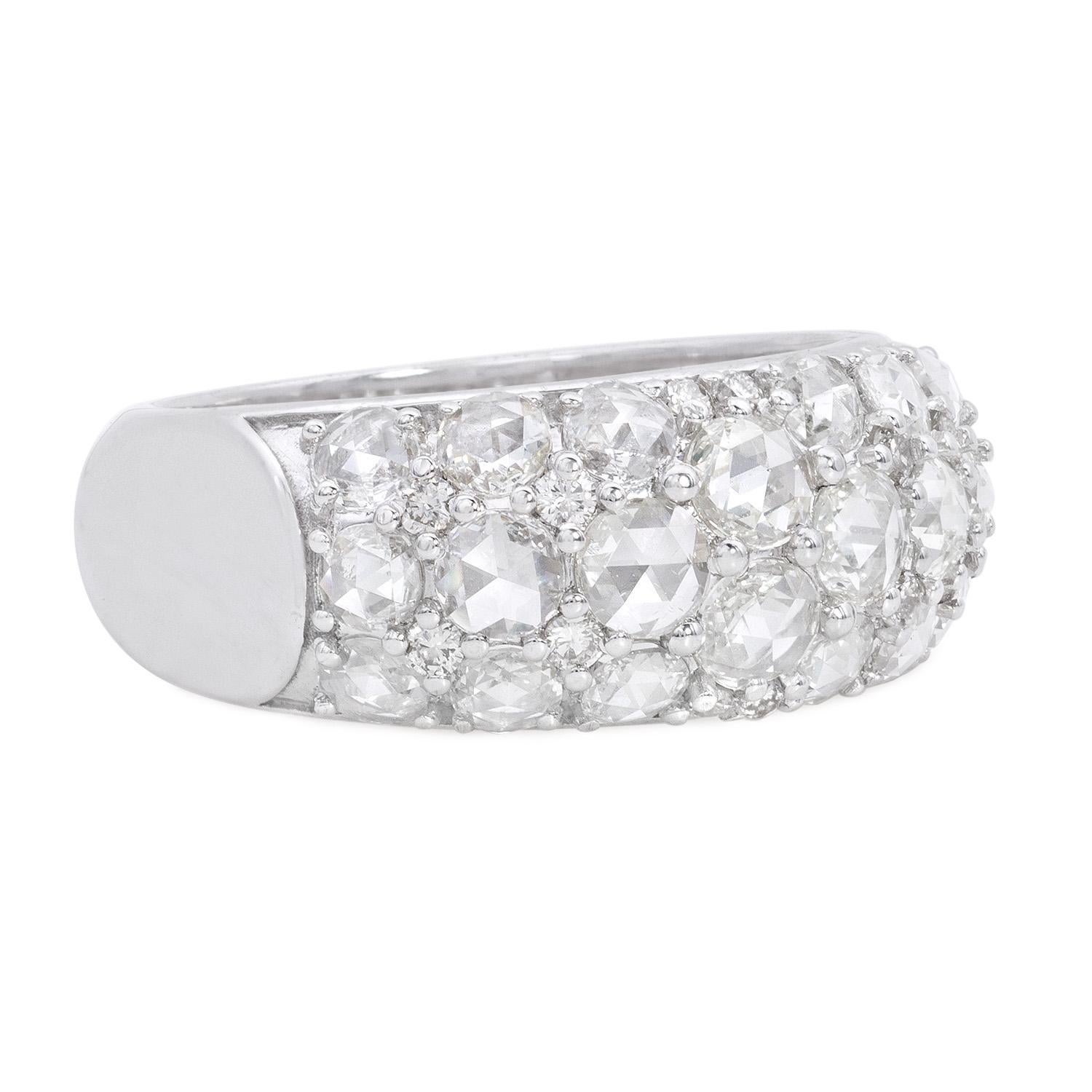 Introducing our exquisite Rose Cut Cluster Ring, a true masterpiece that combines the timeless allure of rose-cut diamonds with the opulence of 18K gold. This ring is designed to adorn your hand with elegance and grace, offering a captivating blend