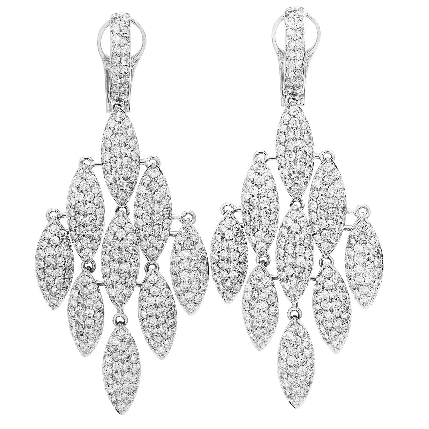 These Chandelier-style drop design earrings are full of sparkle!

Crafted in solid 14K White Gold, 

Nine cluster marquise shape links, dangle from each diamond-accented earring, 

A total of 342 round-cut diamonds weighing approximately 7.29 carats
