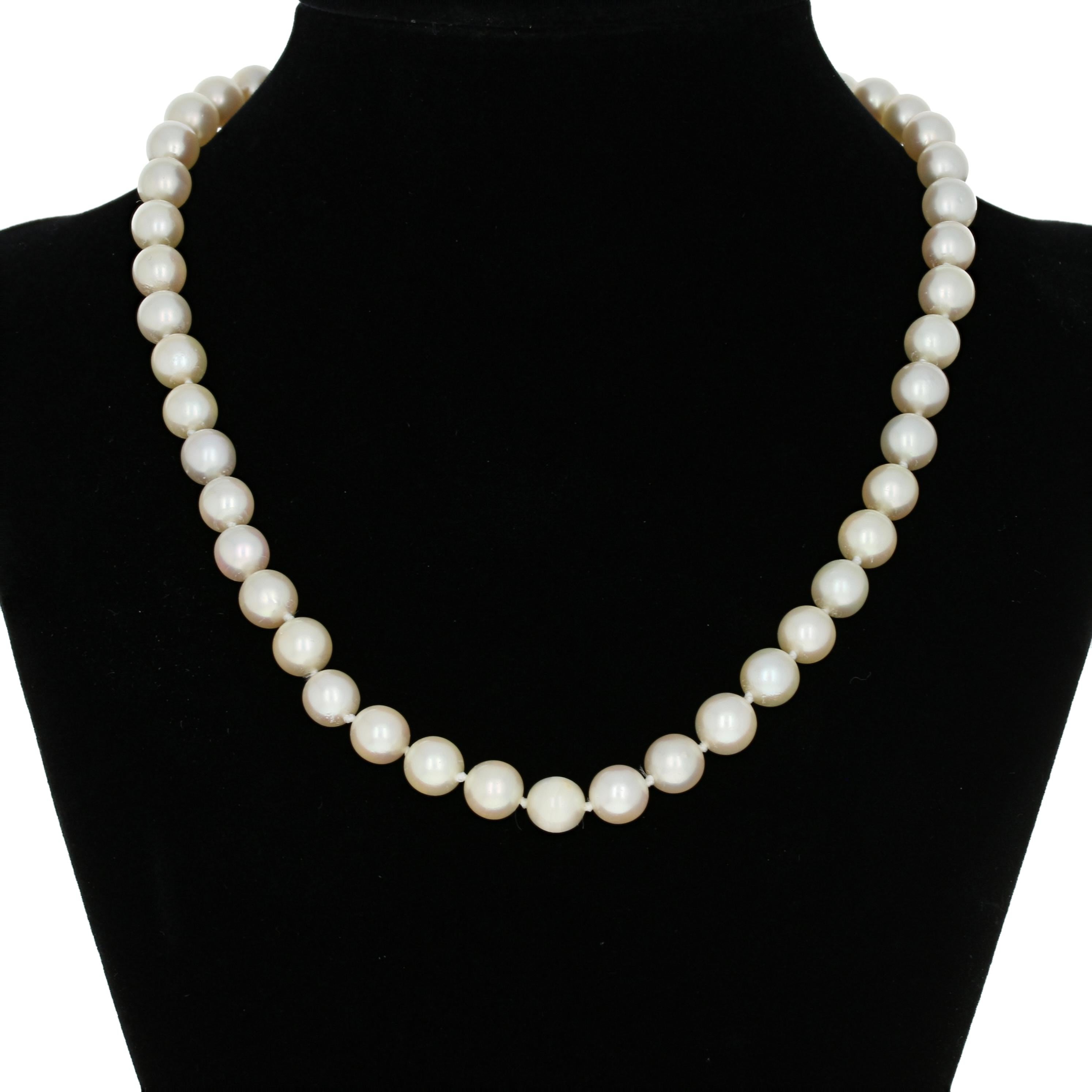 Metal Content: Guaranteed 14k Gold as stamped

Stone Information:
Cultured Pearls 
Diameters: 7.2mm - 7.6mm 

Necklace Style: Knotted Strand
Measurements: length 16