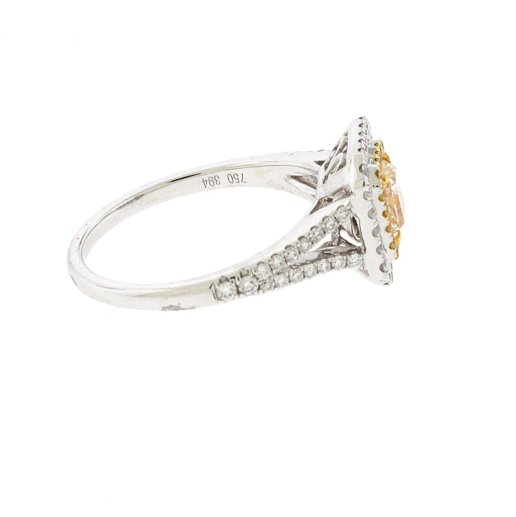 Modern .73 Carat Radiant Cut Yellow Diamond Engagement Ring, 18 Karat White Gold
