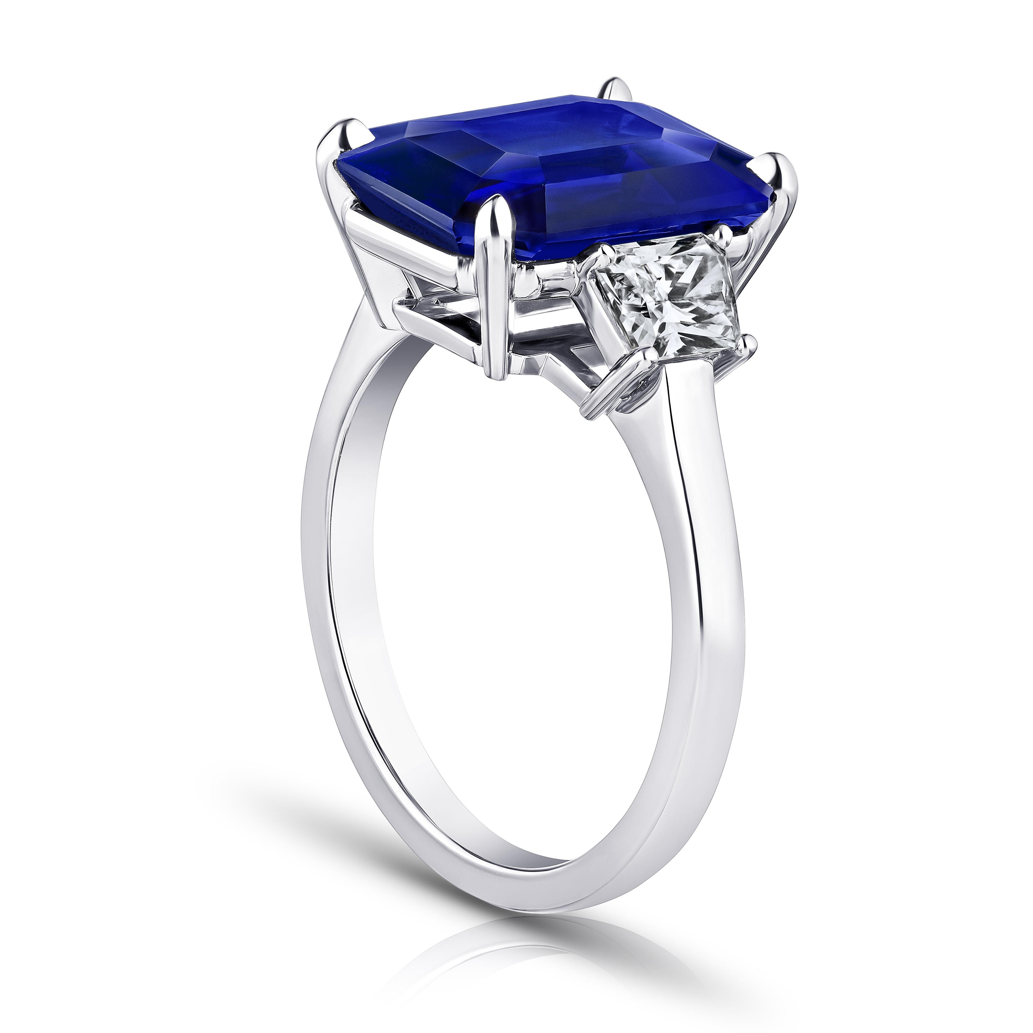 Contemporary 7.30 Carat Emerald Cut Blue Sapphire and Diamond Ring