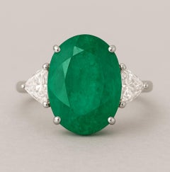 7.30 Carat Insignificant Natural Green Oval Emerald Cocktail Ring