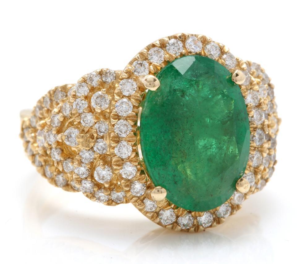 7.30 Carats Natural Emerald and Diamond 14K Solid Yellow Gold Ring

Total Natural Oval Cut Emerald Weight is: Approx. 6.00 Carats (transparent )

Emerald Measures: Approx. 13.00 x 10.00mm

Natural Round Diamonds Weight: Approx. 1.30 Carats (color
