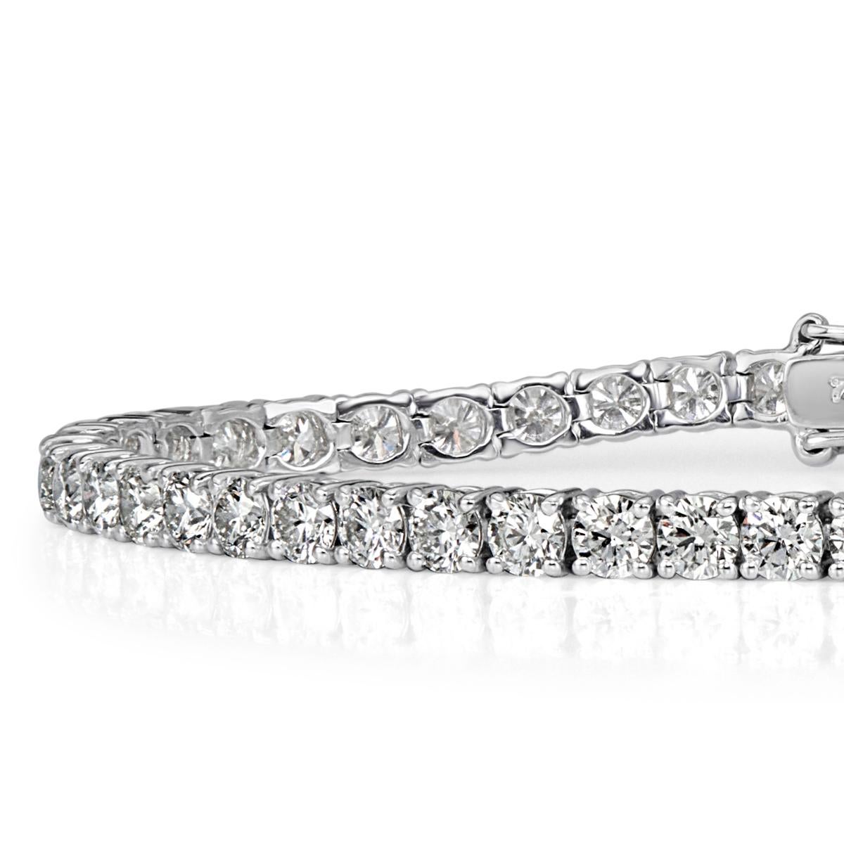 This elegant tennis bracelet features 7.30ct of round brilliant cut diamonds graded at G-H, VS2-SI1. The diamonds are impeccably matched and prong set in 18k white gold.
