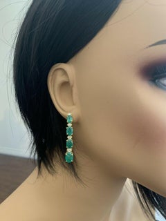 7.30 Carat Natural Emerald and Diamond 14 Karat Solid Yellow Gold Earrings