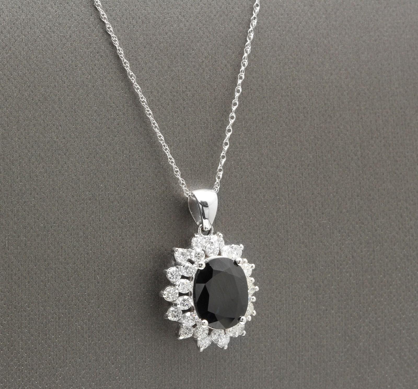 7.30Ct Natural Sapphire and Diamond 14K Solid White Gold Necklace

Amazing looking piece! 

Stamped: 14K

Suggested Replacement Value: $6,500.00 

Natural Oval Cut Sapphire Weights: Approx. 6.00 Carats

Sapphire Measures: Approx. 12.00 x